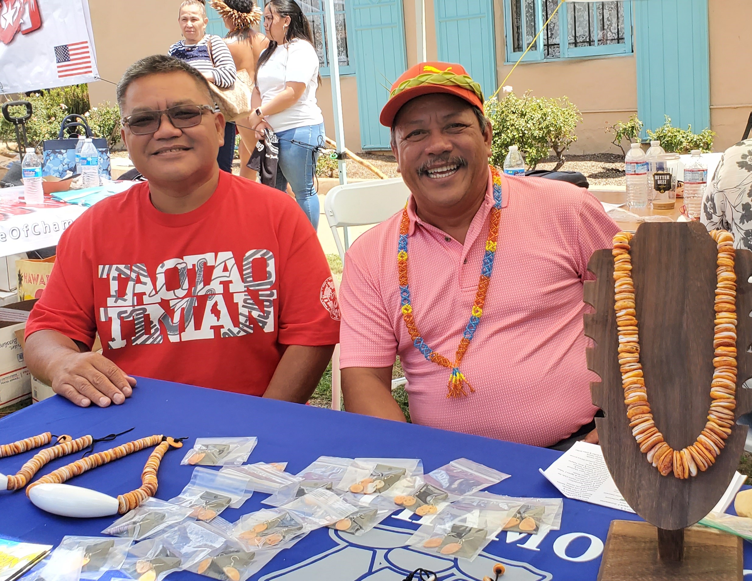 Tinian Mayor Edwin P. Aldan and local carver Matthew Masga showcase some of the islands’ most vibrant shell jewelry.