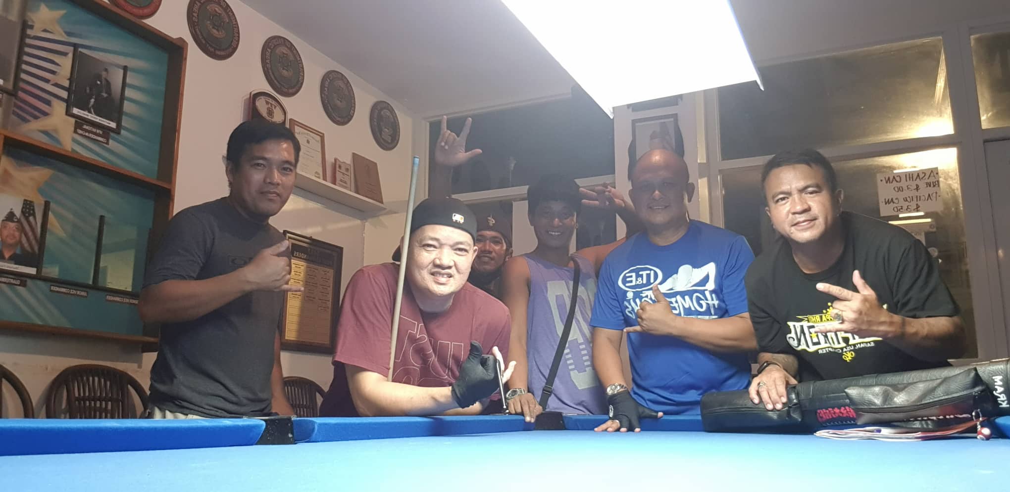The VFW IT&E Destroyers and 9 Eleven B.E. Skeptron pose for a photo after their match in the Tuesday Division of the SBA Budweiser Open 8-Ball League at the VFW Bar.