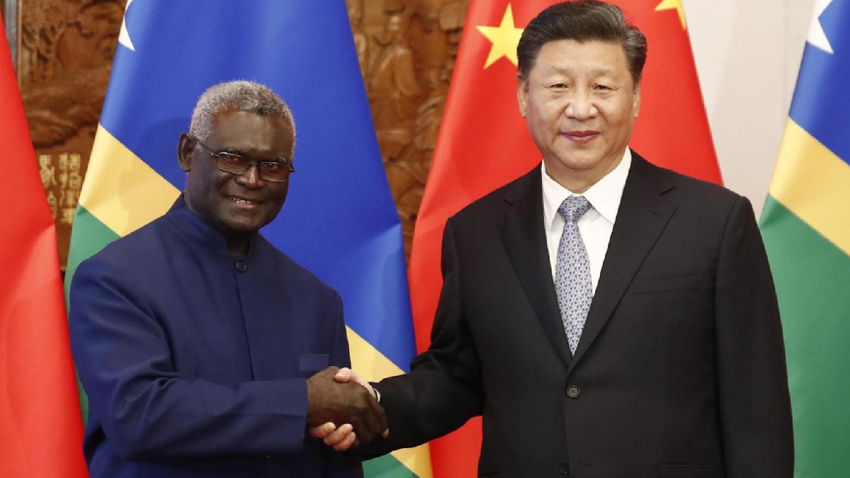 Chinese President Xi Jinping, right, with Solomon Islands Prime Minister Manasseh Sogavare.