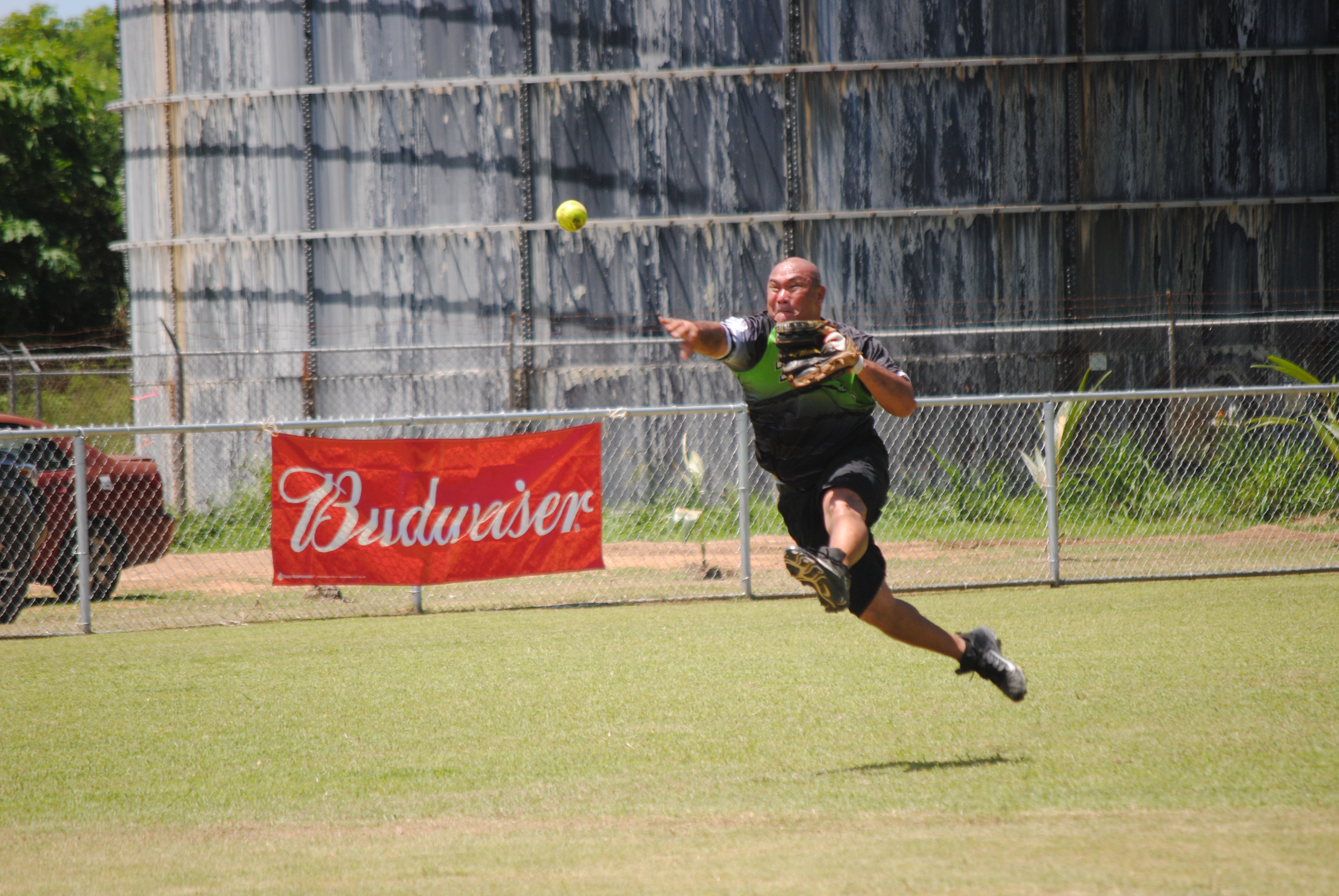 Tokahao's Robert Bansil throws to first base for the out during a 2022 Budweiser Belau Amateur Softball League game Sunday at the Dandan baseball field.