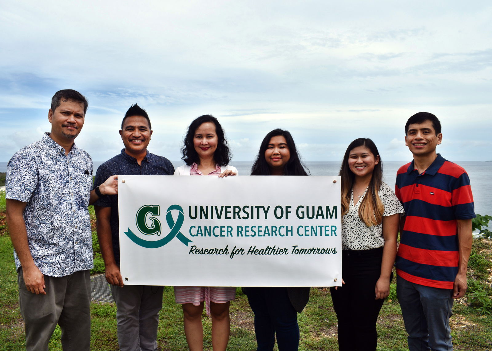 A team from the University of Guam Cancer Research Center developed the Fuetsan Manhoben Youth Substance Use Prevention Program. Using culturally grounded curriculum, the program aims to prevent e-cigarette, tobacco, and betel nut use among Guam middle school students. From left, Francis Dalisay, co-project leader; Tim Dela Cruz, co-investigator; Catherine Payne, project associate; and Gabrielle Ooka, Zhantelle Beltran, and Aaron Perez, research associates.