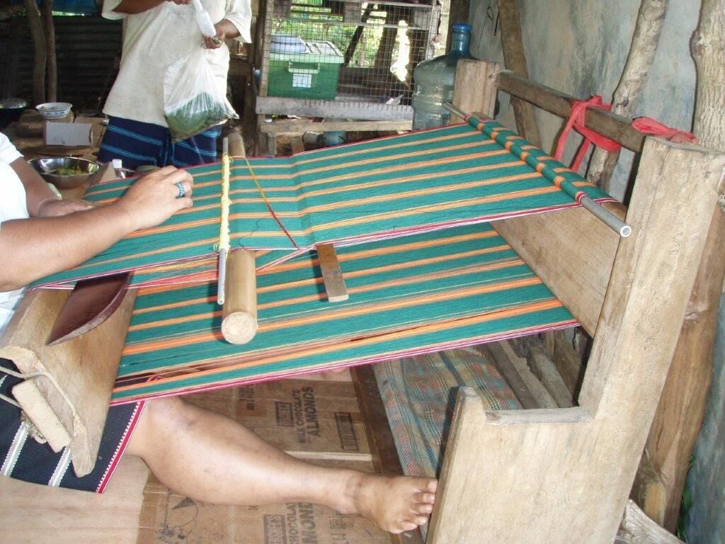 Weaving a lavalava on Falalop Island, Ulithi Atoll.
