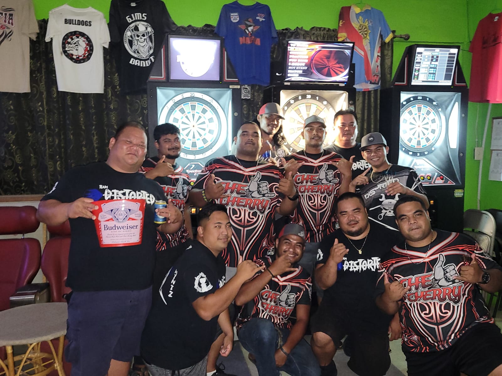 6JMS Che' Cherry and Tambayan Distorted pose for a photo after their match Thursday in the Fanihi Thursday “B” Division of the SEDA Bud Light Dart League at 6JMS Bar.