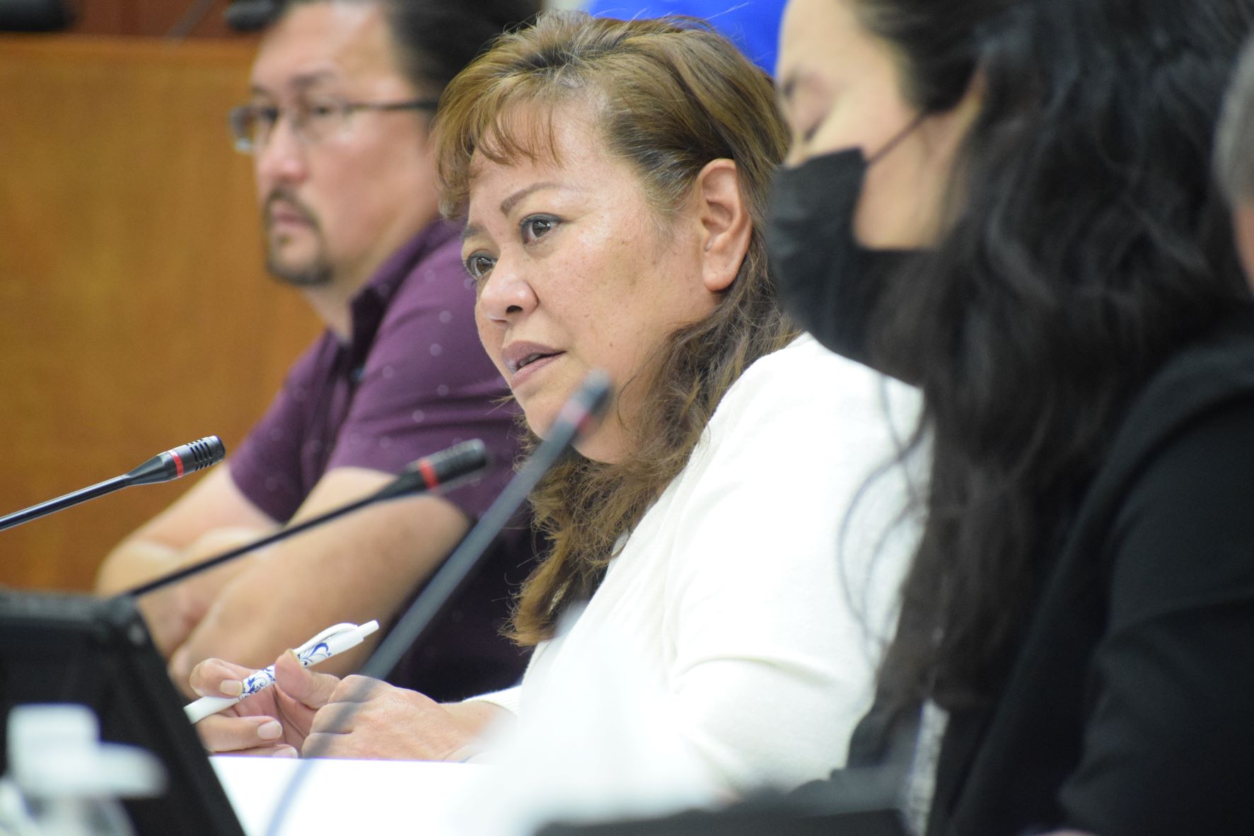 The chair of the House Judiciary and Governmental Operations Committee, Rep. Celina Babauta, speaks during a House session in this file photo. Seated next to her are Reps. Edwin Propst, left, and Tina Sablan, right.