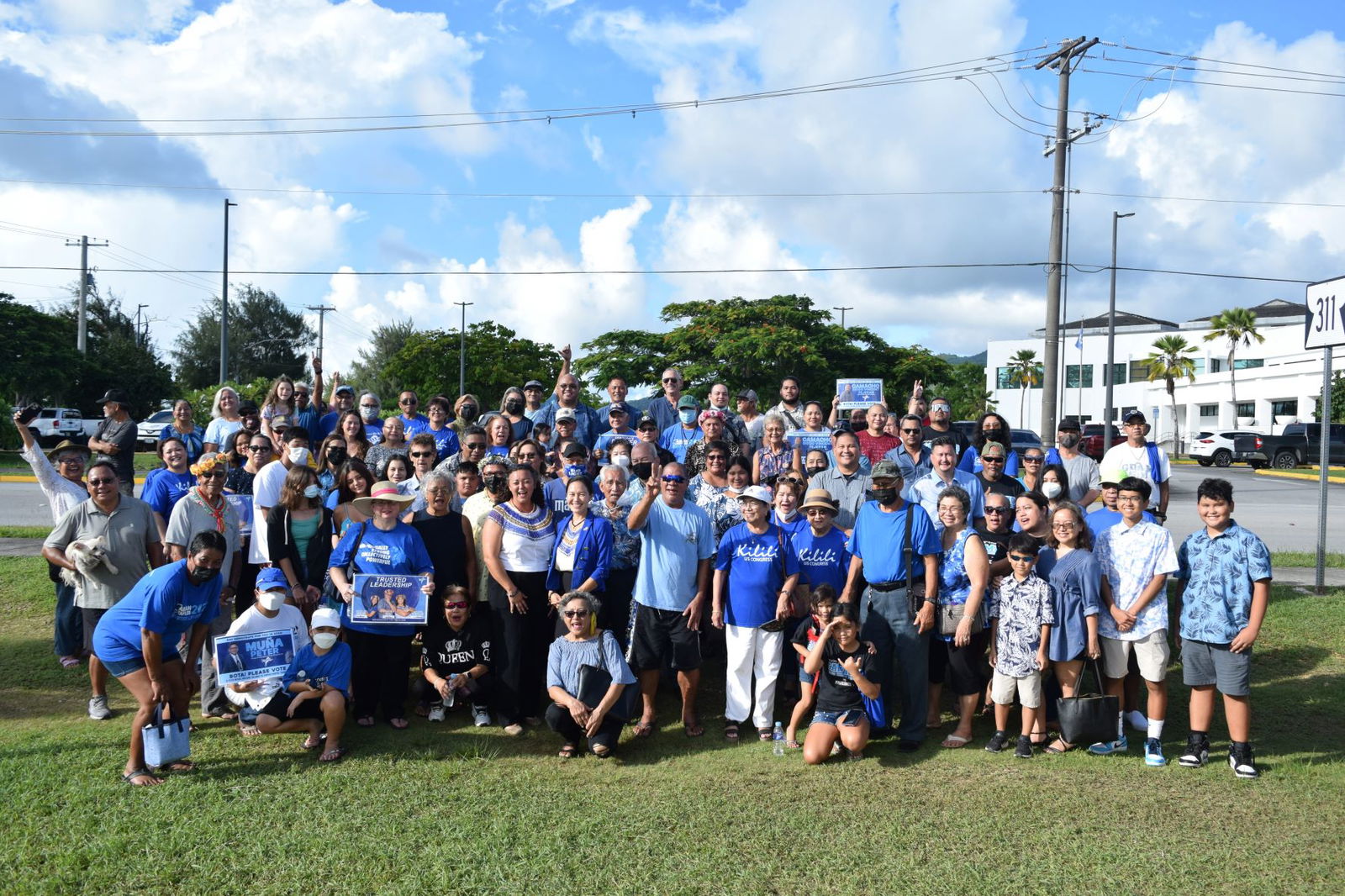 The NMI Democratic Party candidates pose for a photo with their families and supporters  at the Commonwealth Election Commission on Friday.