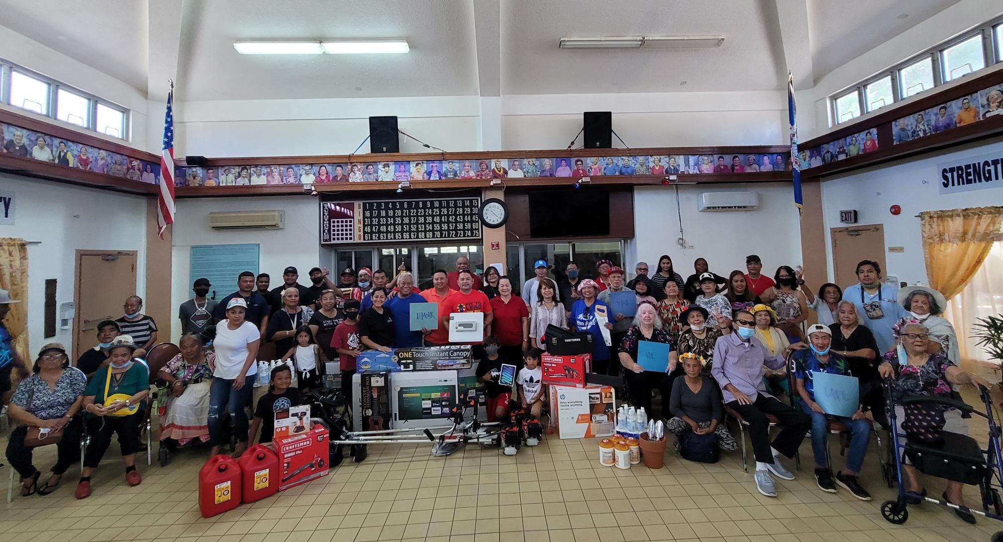 Gov. Ralph DLG Torres, first lady Diann T. Torres, Senate Floor Leader Vinnie F. Sablan, Republican Precinct 3 House candidates Alfredo Saures, Carl Hocog, Grace Sablan pose for a photo with senior citizens on Saturday. The group led by the governor and other community groups donated several items to the senior citizens.