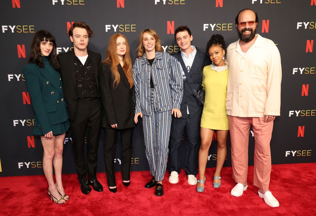 Cast members Natalia Dyer, Charlie Heaton, Sadie Sink, Maya Hawke, Noah Schnapp, Priah Ferguson and Brett Gelman pose at a special event for the television series "Stranger Things" at Raleigh Studios Hollywood in Los Angeles, California, May 27, 2022.