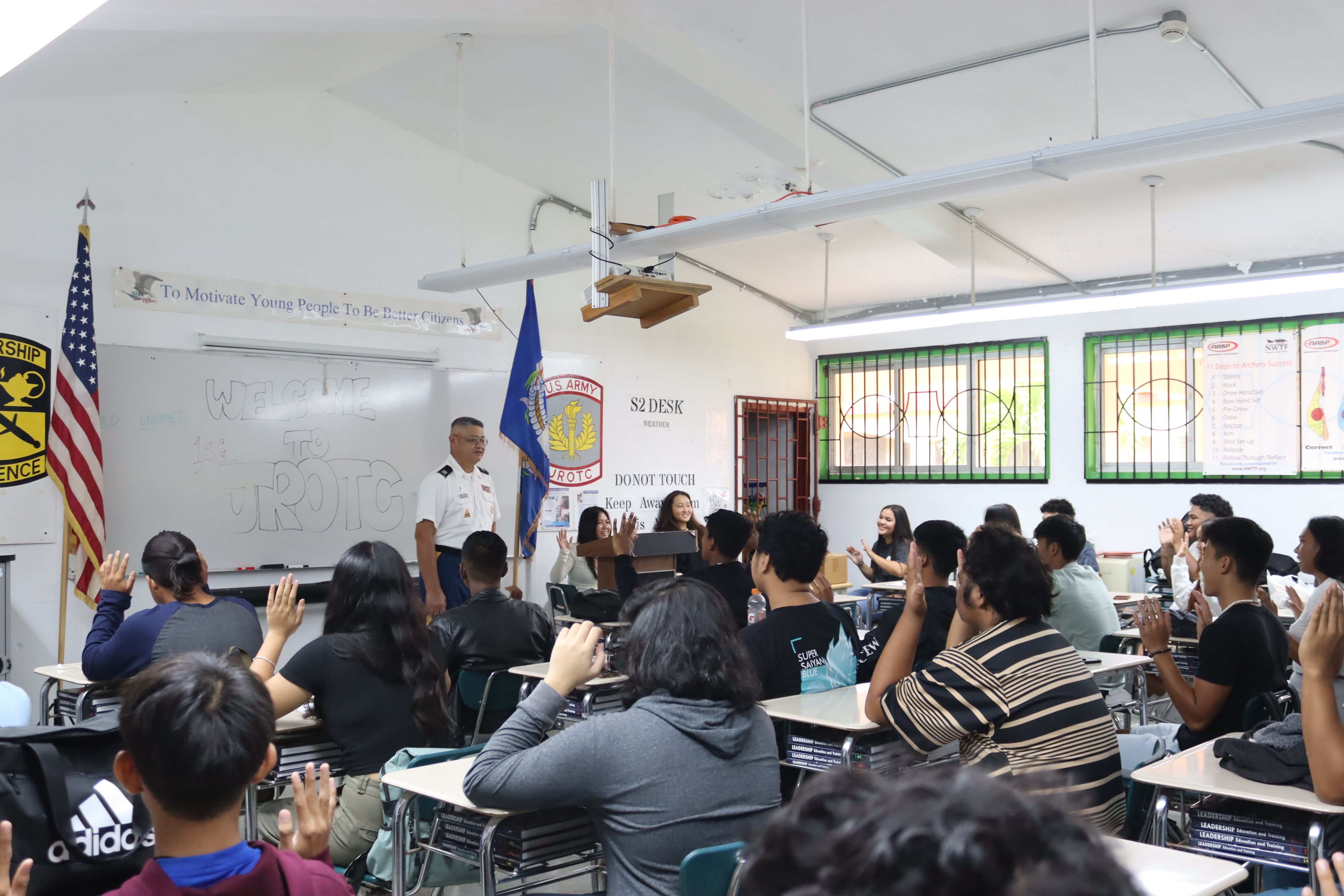 Senior Army Instructor Capt. Joseph Santos speaks to the cadets of the Tinian Stallion Battalion.