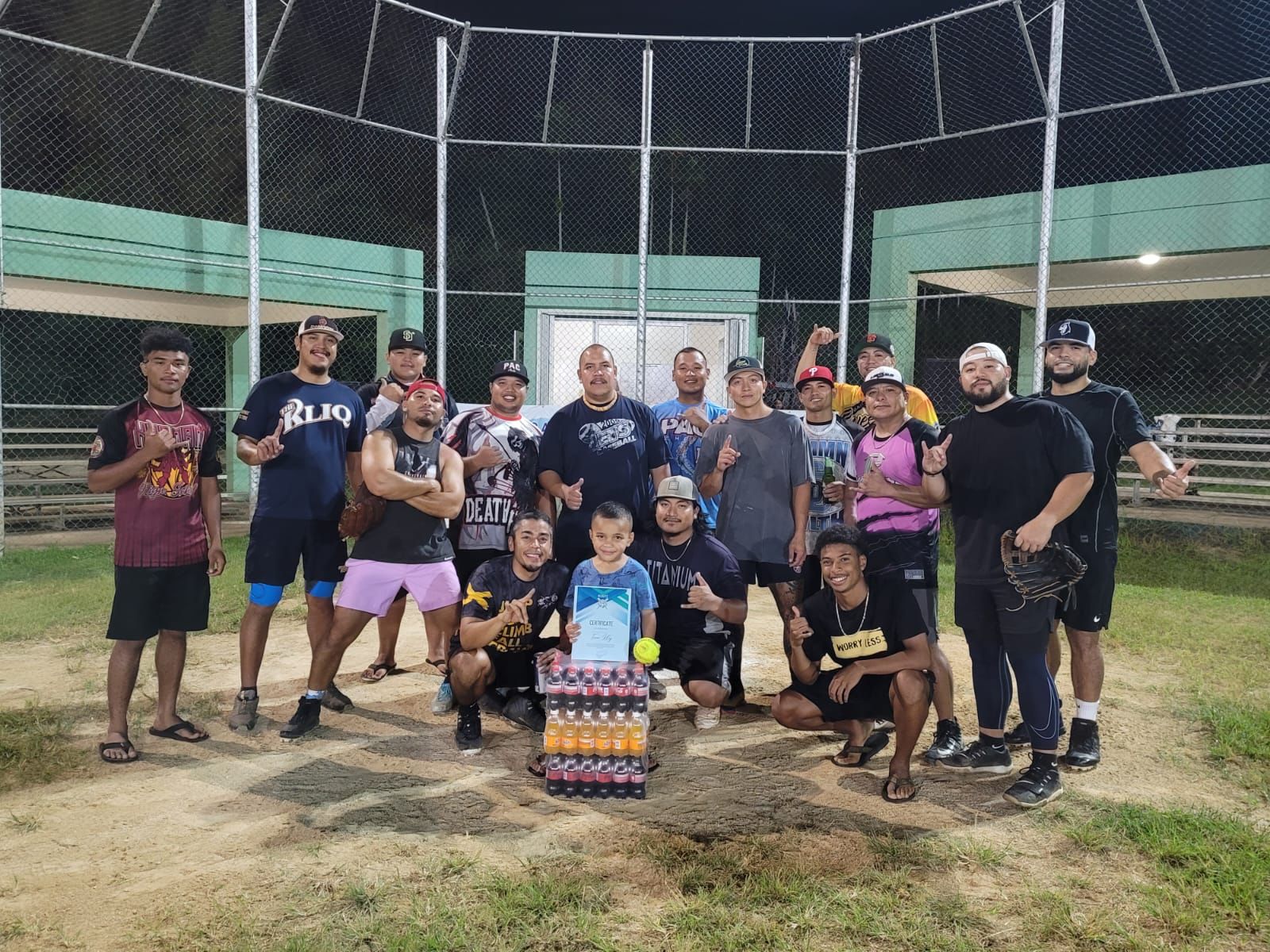 KLIQ players pose with their prizes after winning the fundraising Scoutz U18 Baseball Team Softball Tournament on Saturday at the Capital Hill ballfield.