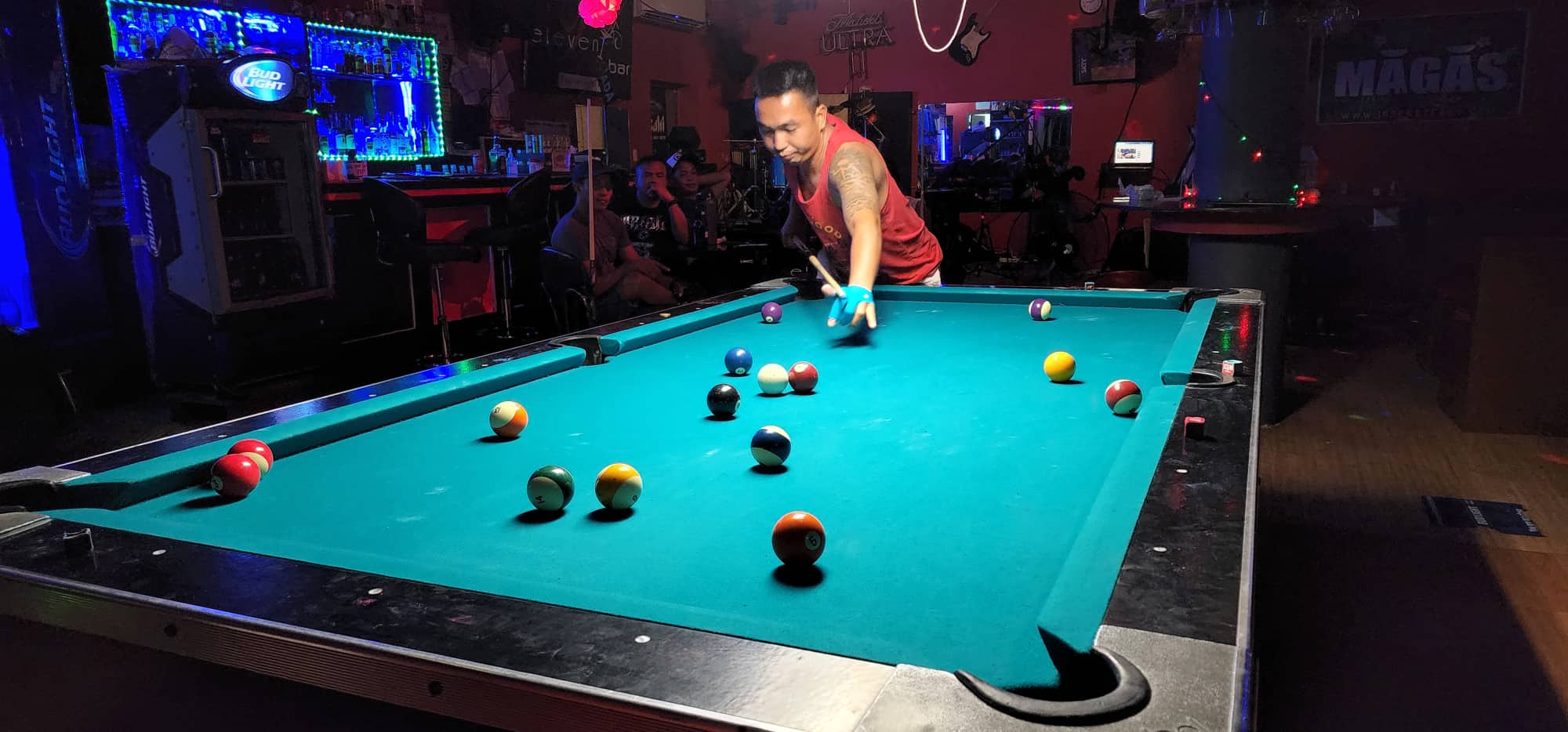 Bamboo Soudelor Construction's Chester Hamoy looks on after his shot during a Thursday Division game of the SBA Budweiser Open 8-Ball League at the 9 Eleven Restobar.