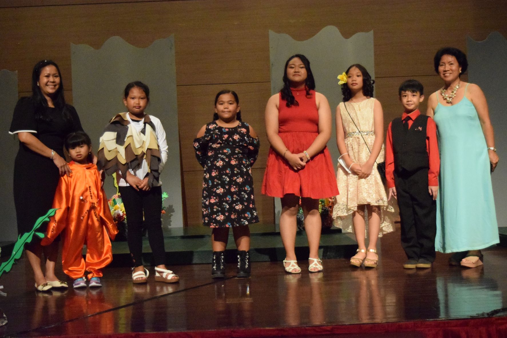 GMS Principal Milagros Songcuan, right, and teacher Maricel Javier, left, pose for a photo with Kinder 5 student Yzzabella Vergel De Dios, fourth grader Johana Elizabeth Sarabia, third grader Juslynn Mizutani, fifth graders Jamie Palabay and Jewel Mabaquiao, and fourth grader  Jarl Mabaquiao following their recital.