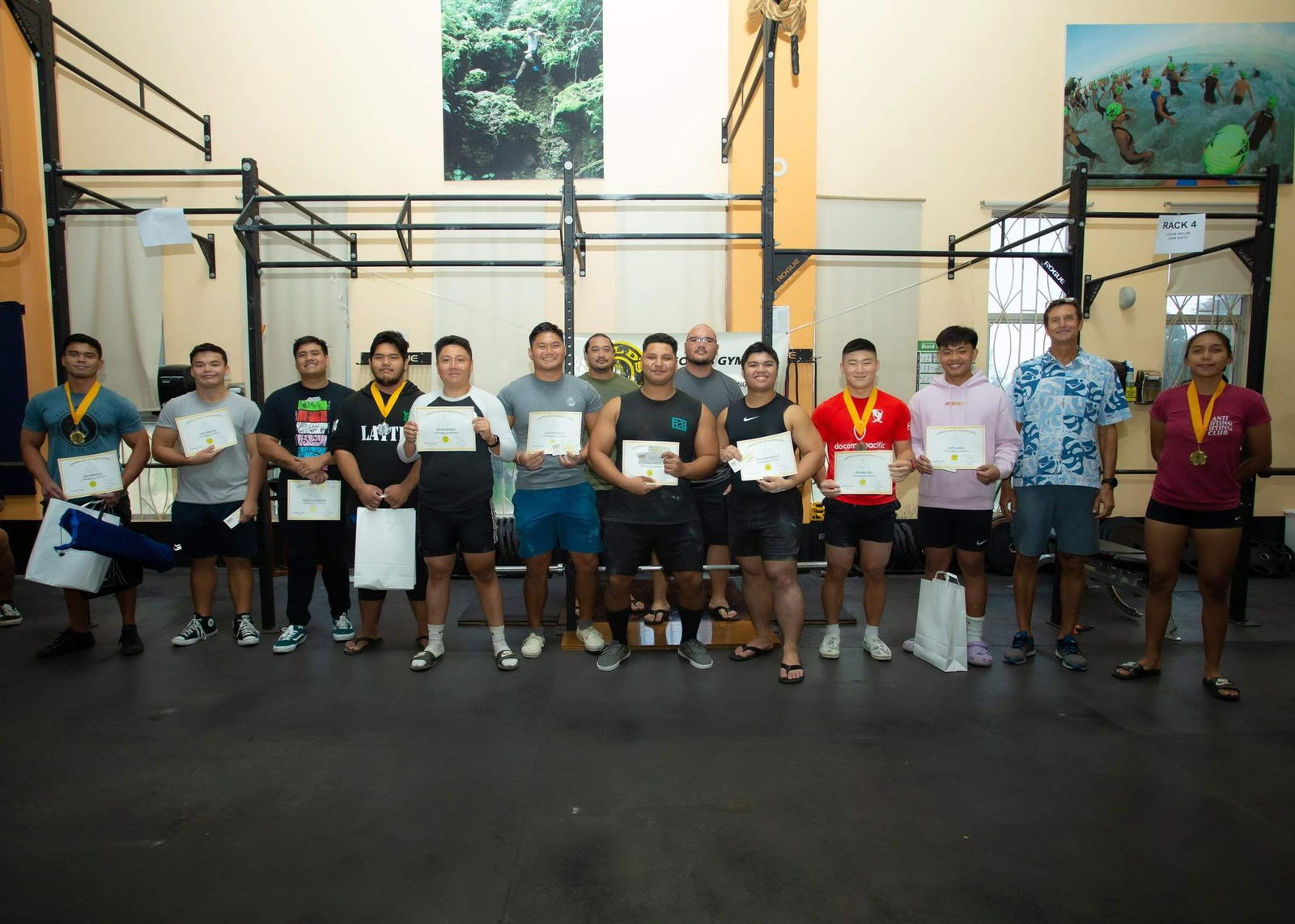 Participants, along with Gold's Gym Saipan General Manager Tyce Mister, pose for a photo after the SBD Powerlifting Meet on Sunday, Aug. 7, at  Gold's Gym Saipan.
