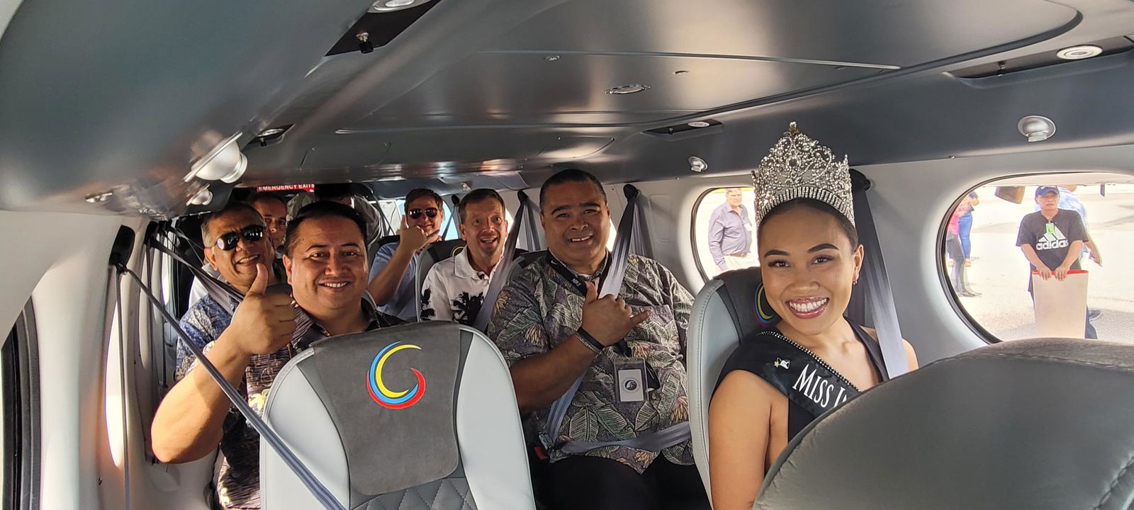 The airlines' first passengers — who include Gov. Ralph DLG Torres, Secretary of Finance, and 2021 Miss Marianas Savannah Delos Santos — pose for a photo before take-off.