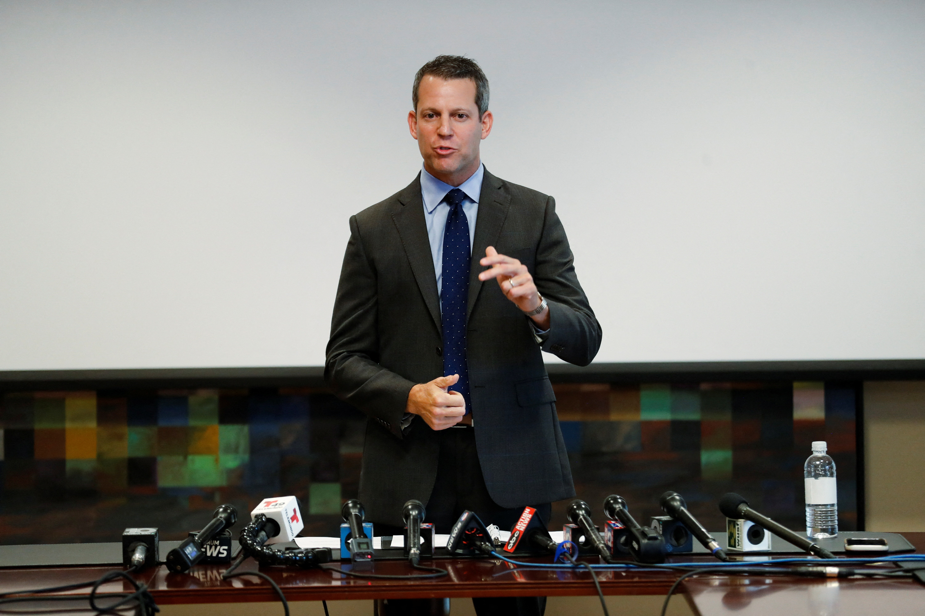 Hillsborough County State Attorney Andrew Warren addresses the media after learning he was suspended of his duties by Florida Gov. Ron DeSantis in Tampa, Florida, Aug. 4, 2022.