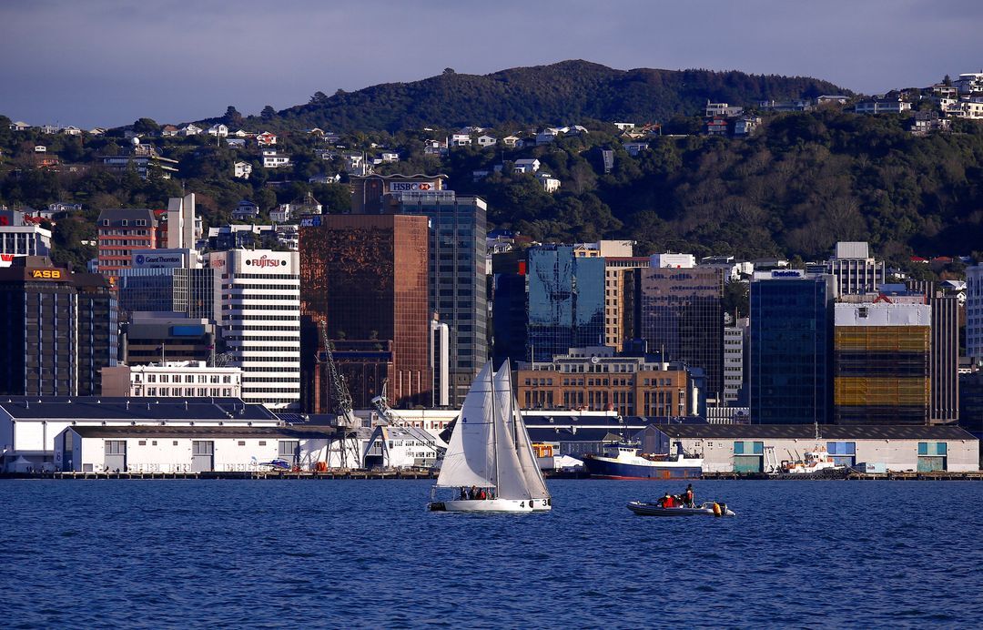 A sailing boat can be seen in front of the central business district of Wellington in New Zealand, July 2, 2017.  