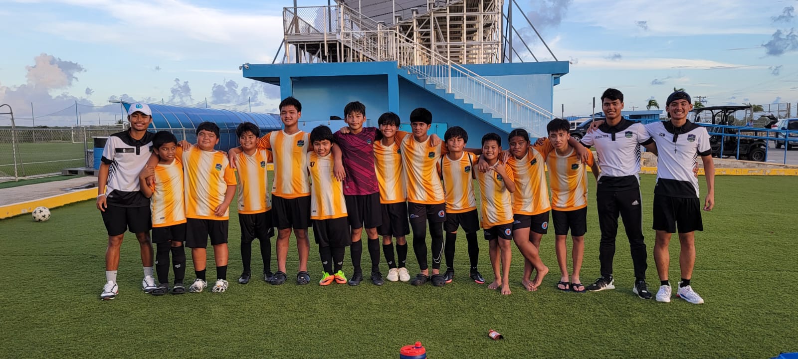 The Kanoa Football Club players are all smiles after winning the U13 Boys Division title of the 2022 Youth Summer Cup Saturday at the NMI Soccer Training Center in Koblerville.