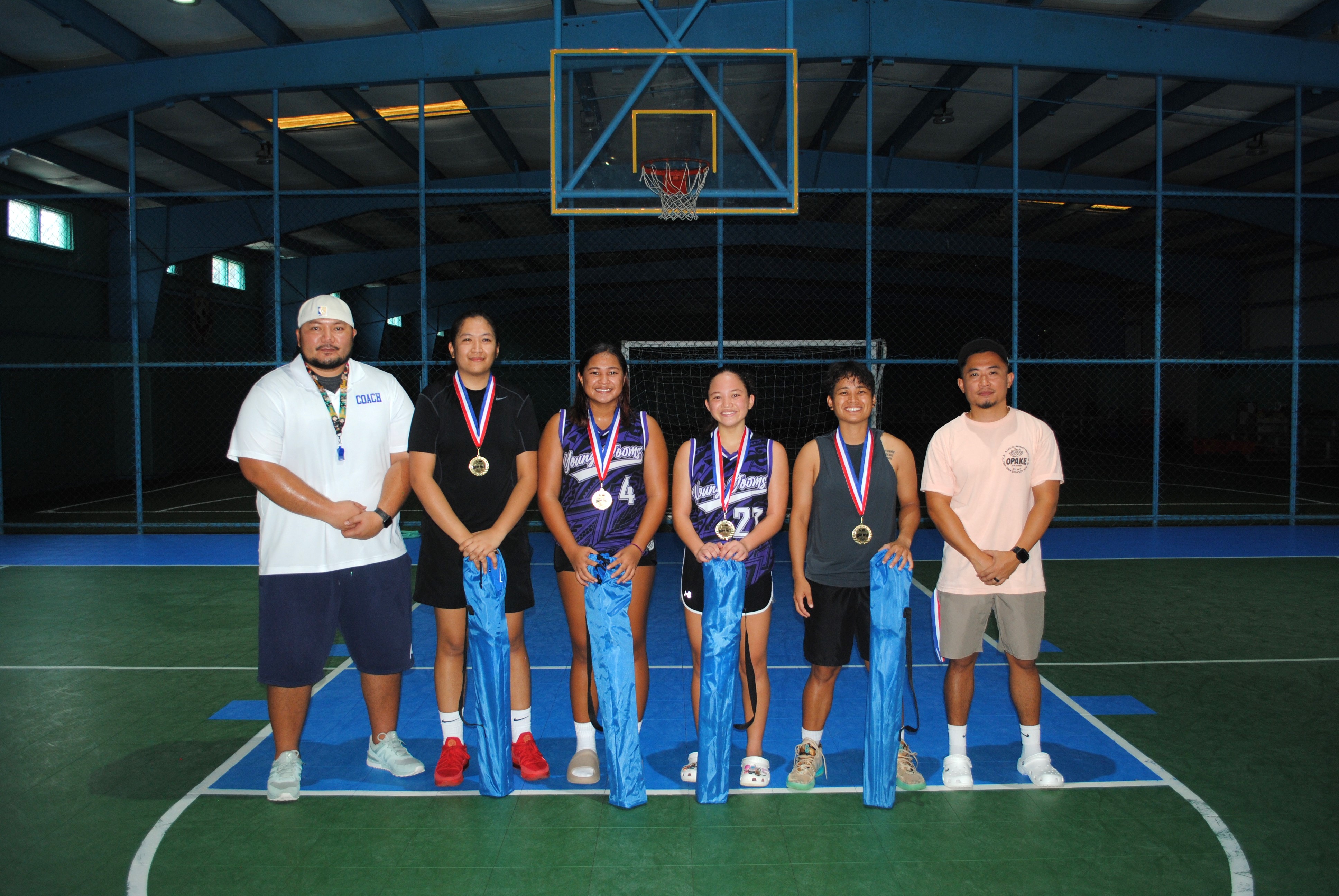 The Hotshots pose with their medals.