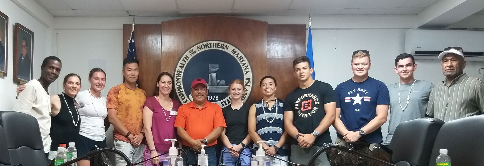 From left, Walt Goodridge, guide, Becca Vavasseur, Ellie Dabney, Captain Bob Qu, Colonel Maria "MJ" Pallotta, PhD., Tinian Mayor Edwin P. Aldan, Ava Izenour, Molly Mangan, Charlie Sewell, Carson Hillier, Aidan Otero, Willy Kaitabu.