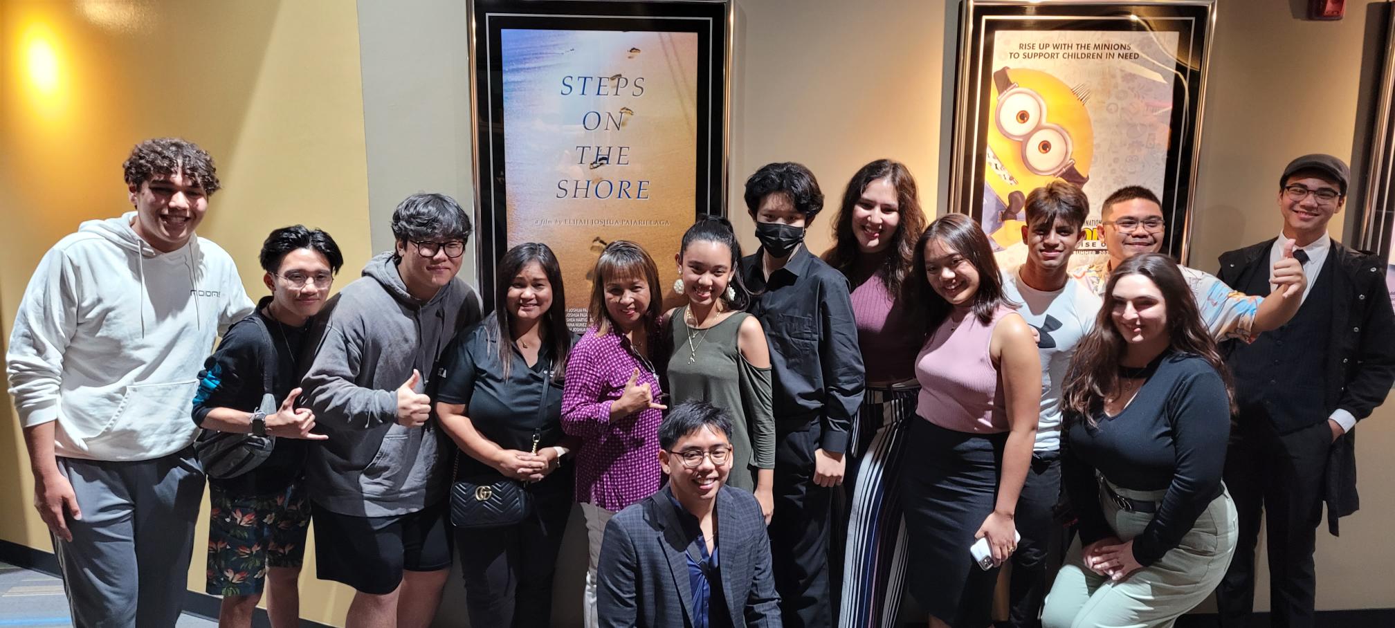 The cast and crew of "Steps on the Shore" gather for a group photo on Monday night at Hollywood Theaters.