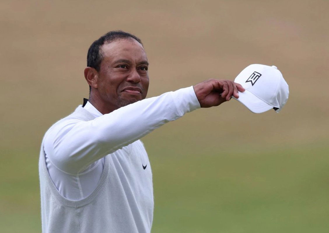 Tiger Woods of the U.S. acknowledges spectators after finishing his second round in the150th Open Championship at the Old Course in St Andrews, Scotland, Britain on July 15, 2022.