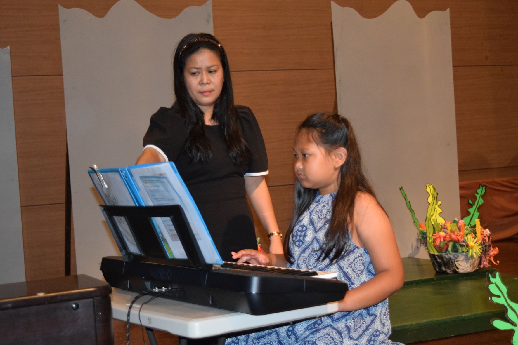 Fourth grader Johana Sarabia performs her recital piece.