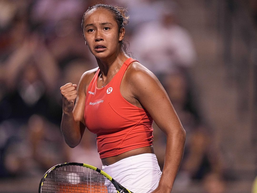 Leylah Fernandez looks to her coach after a point over Storm Sanders — not pictured — at Sobeys Stadium in Toronto, Ontario, Canada on Aug. 8, 2022.