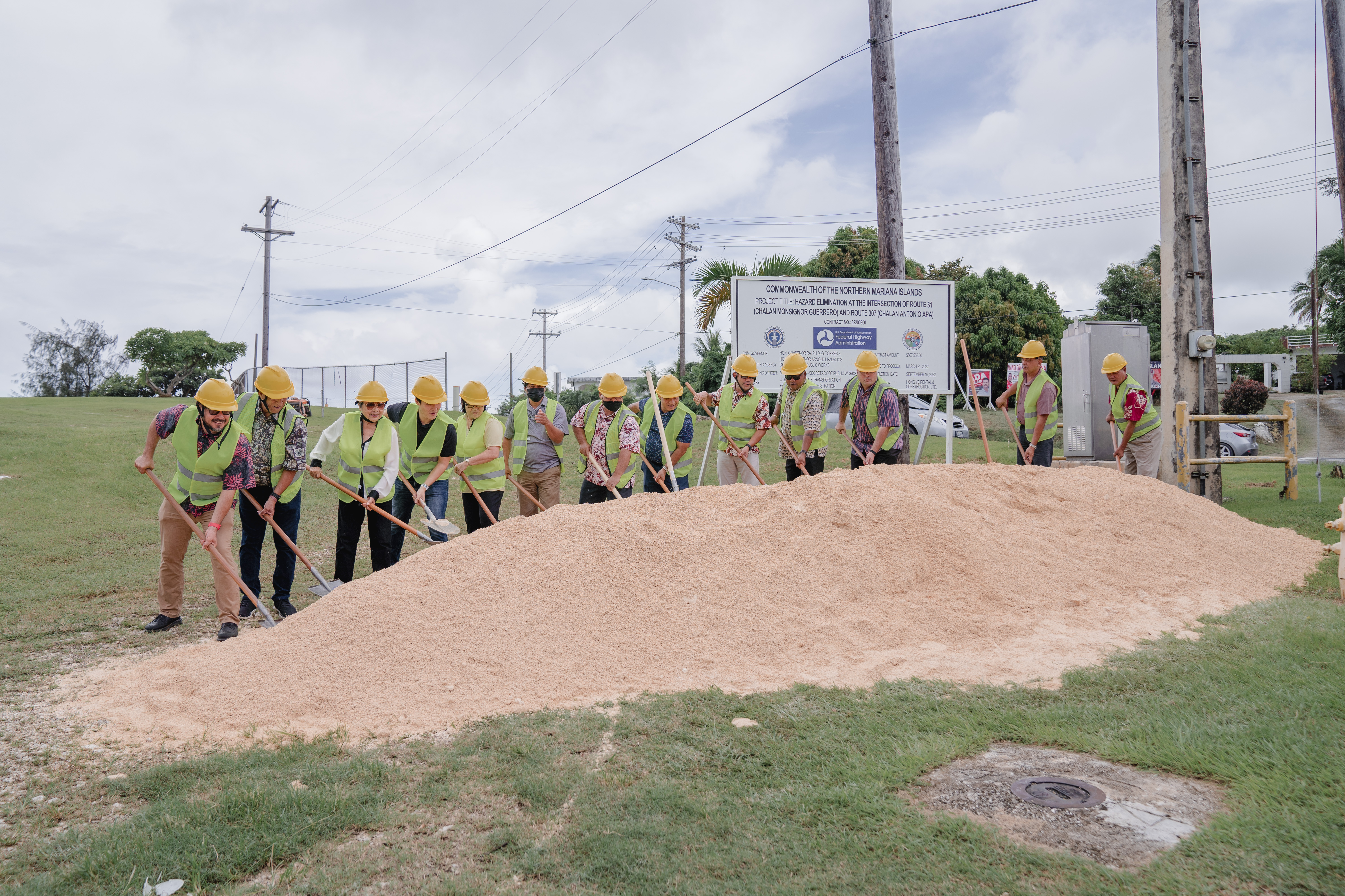 On Tuesday morning, Department of Public Works Secretary James A. Ada and DPW, joined by Northern Marianas College President Dr. Galvin Deleon Guerrero, other officials and dignitaries as well as members of the community, broke ground on the hazard elimination project at the Intersection of Route 31 (Chalan Monsignor Guerrero) & Route 307 (Chalan Antonio Apa).  The project seeks to eliminate the hazard at the intersection of Chalan Monsignor Guerrero and Chalan Tun Antonio Apa by replacing one of the span wire traffic signal poles to a mast arm traffic signal pole and installing a guardrail. DPW Secretary Ada extends his appreciation to the management and staff of the Department of Public Works and the contractors for their work in making this project possible, and appreciates the patience of the public in preparation of the completion of this project. This project is expected to be completed by mid-September, and is funded by the U.S Department of Transportation Federal Highway Administration.