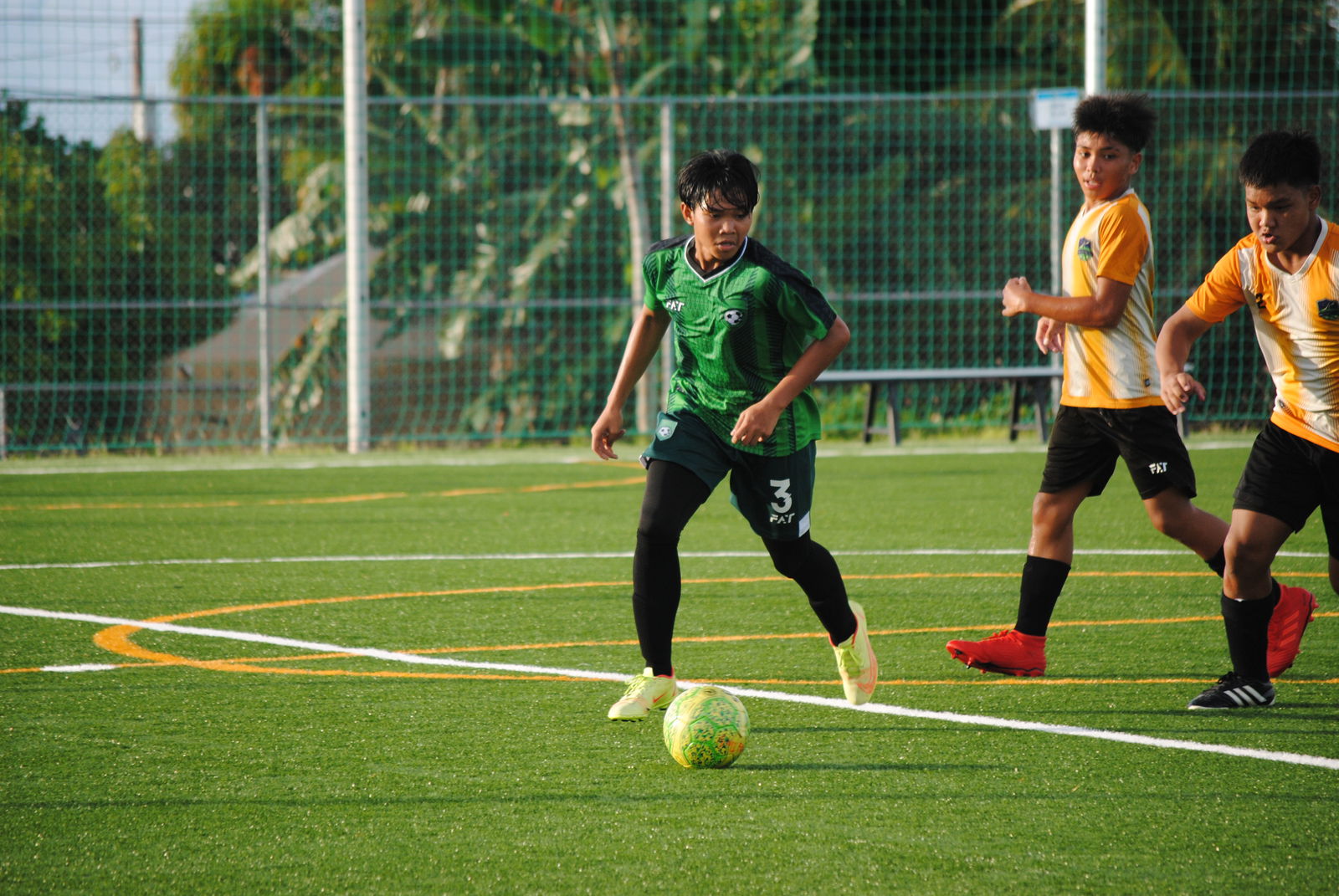 Tan Holdings’ Jonne Navarro looks on as he sets up the play during the U16 Boys Division championship game of the 2022 Youth Summer Cup on Saturday at the NMI Soccer Training Center in Koblerville.