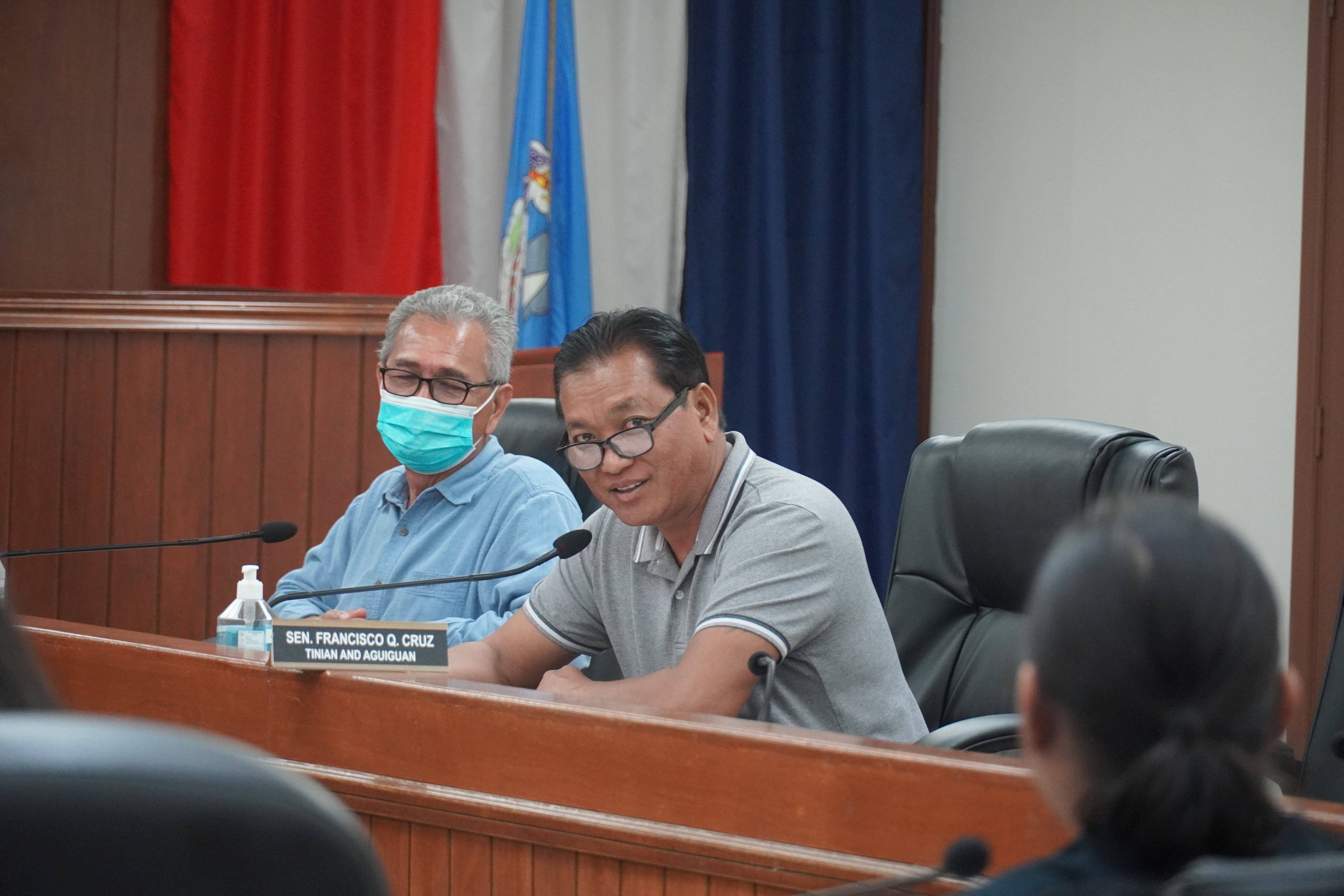 Sen. Francisco Q. Cruz poses a question as Senate Vice President Justo S. Quitugua looks on.