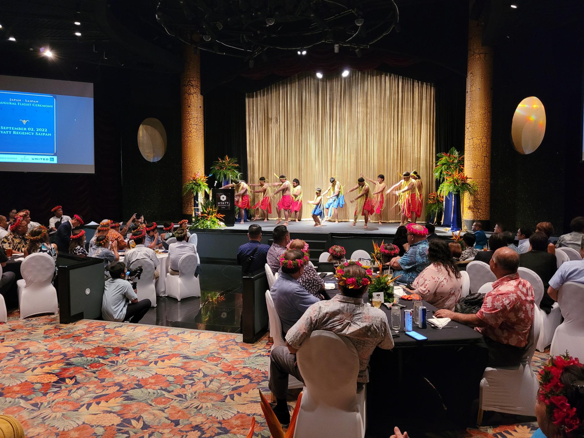 Refaluwasch Warriors perform a traditional dance during a reception at the Hyatt Friday night to celebrate the resumption of the Japan-Saipan flight service.