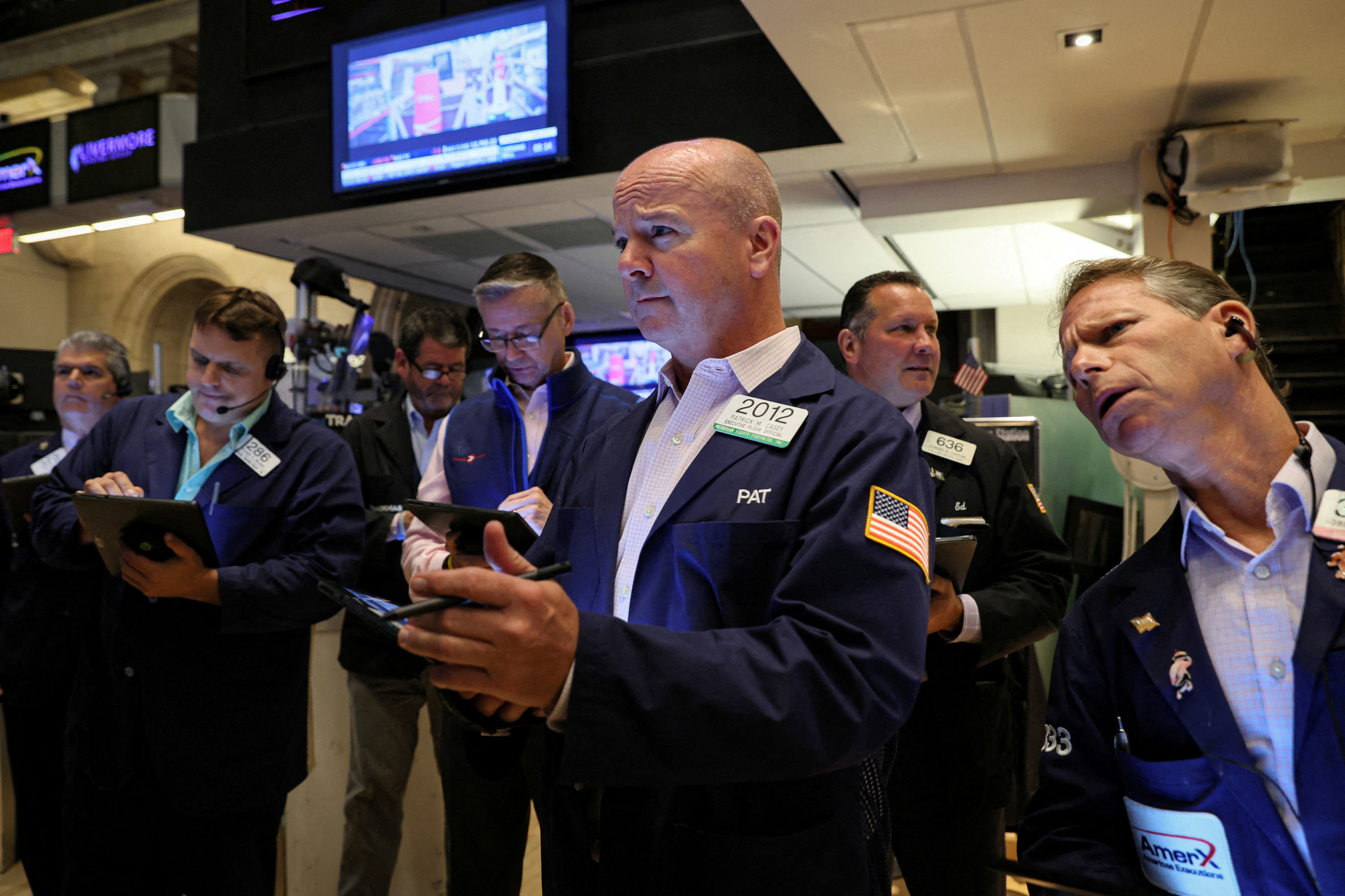 Traders work on the floor of the New York Stock Exchange in New York City, Aug. 22, 2022.