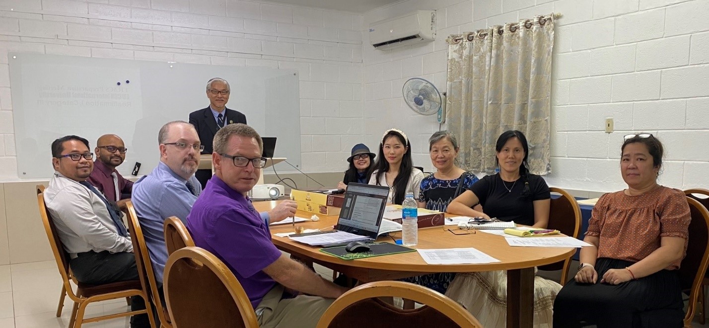 Dr. Christian Wei, EUCON president, standing background, and team members  Dr. Joel Madasu, Rapture Tarlit, Dr. Sean Sartler, Dr. Wade Bacon, Dr. Carmen Fernandez, Dr. Christa Smith, Dr. Judy Wei, Lucy Sartler, Menchu de Jesus, Hanna de Leon, Olen Hong and Steven Wang.