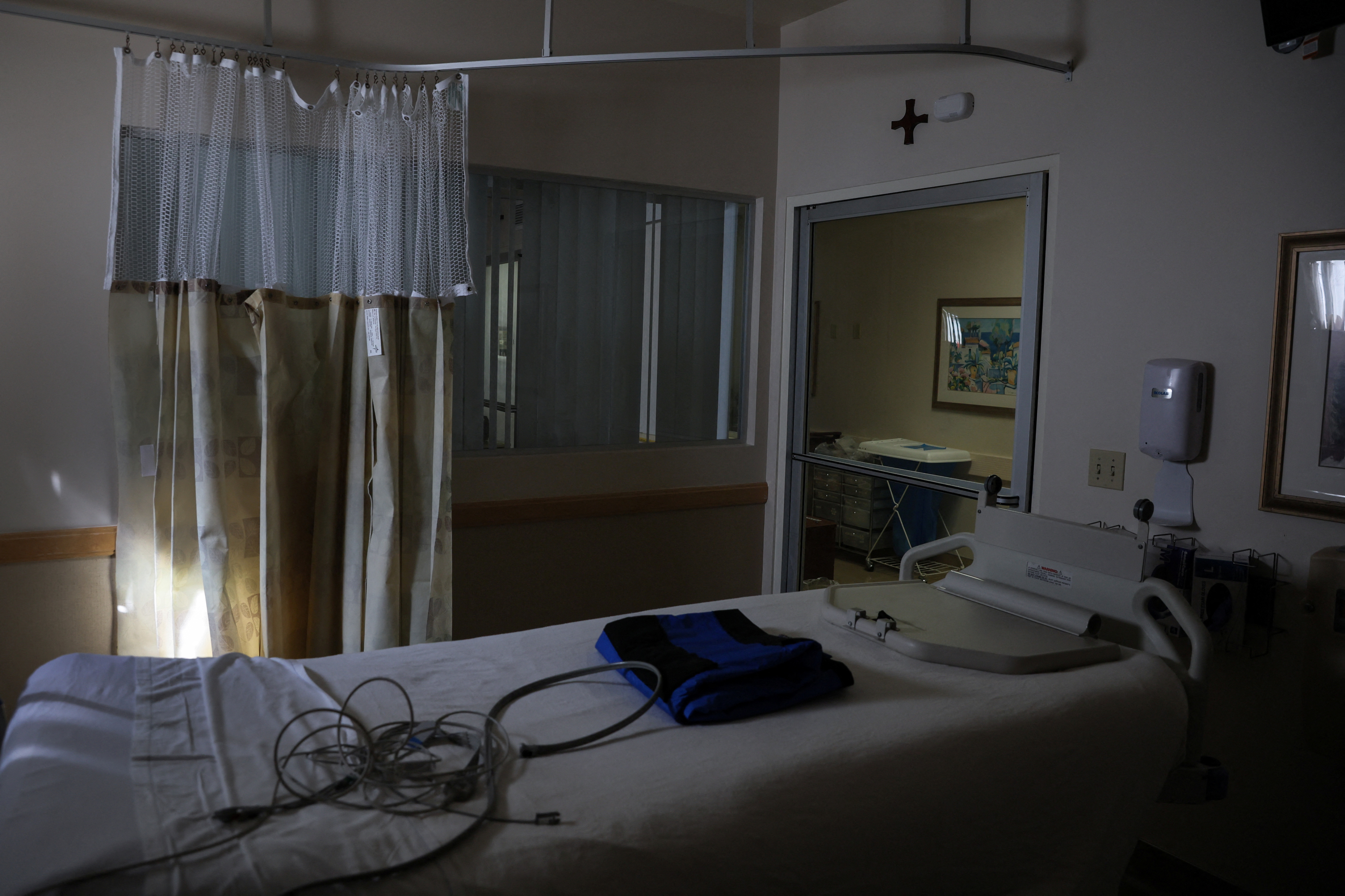 An empty hospital bed sits inside the former Intensive Care Unit for coronavirus disease patients at Providence Mission Hospital in Mission Viejo, California, April 12, 2022.