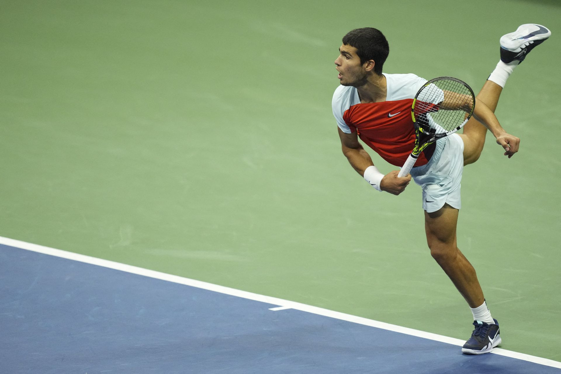 Carlos Alcaraz serves against Casper Ruud in the men's singles final on day 14 of the 2022 U.S. Open tennis tournament at USTA Billie Jean King Tennis Center in Flushing, NY, Sept. 11, 2022.