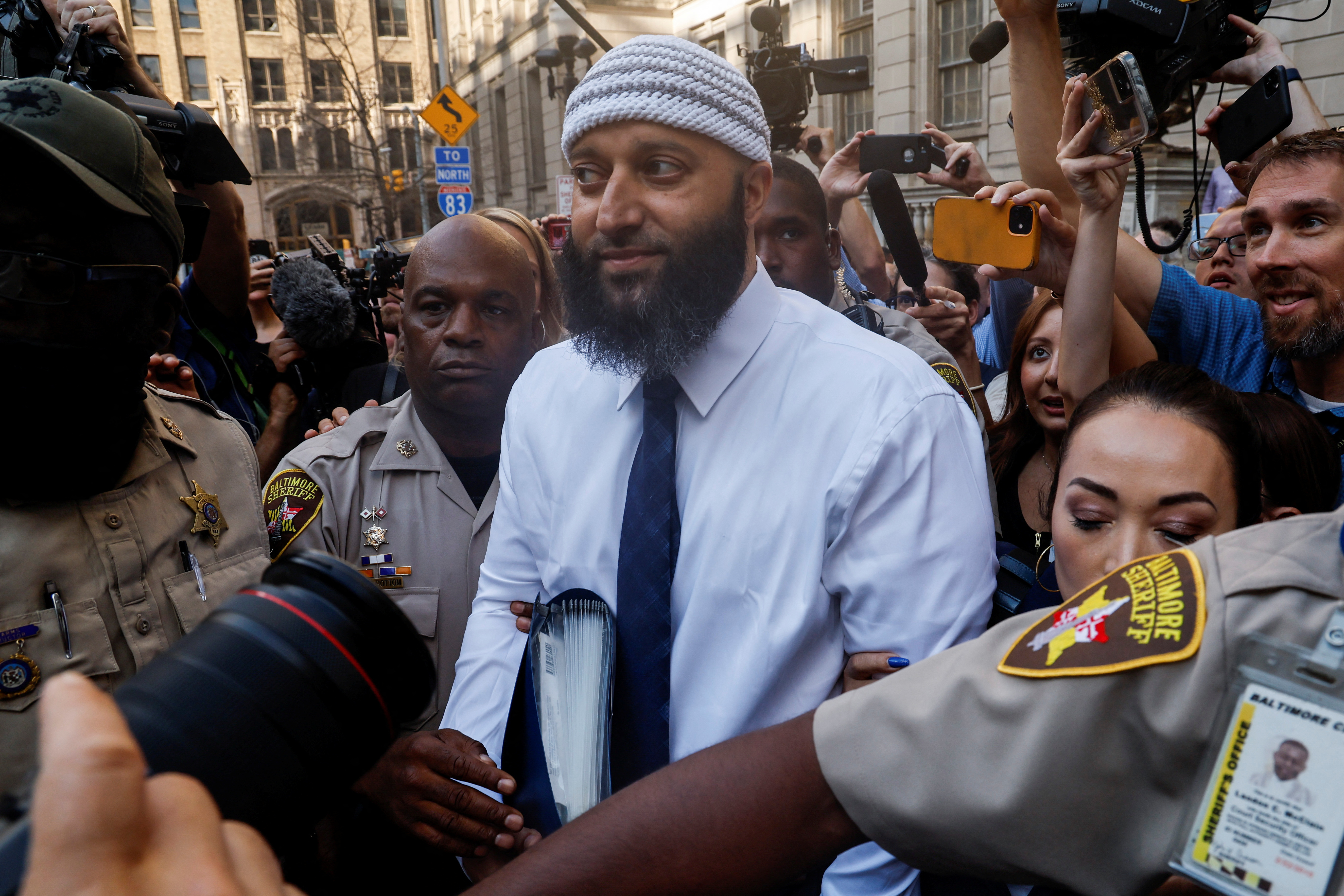 Adnan Syed, whose case was chronicled in the hit podcast “Serial,” departs after a judge overturned Syed's 2000 murder conviction and ordered a new trial during a hearing at the Baltimore City Circuit Courthouse in Baltimore, Maryland, Sept. 19, 2022.