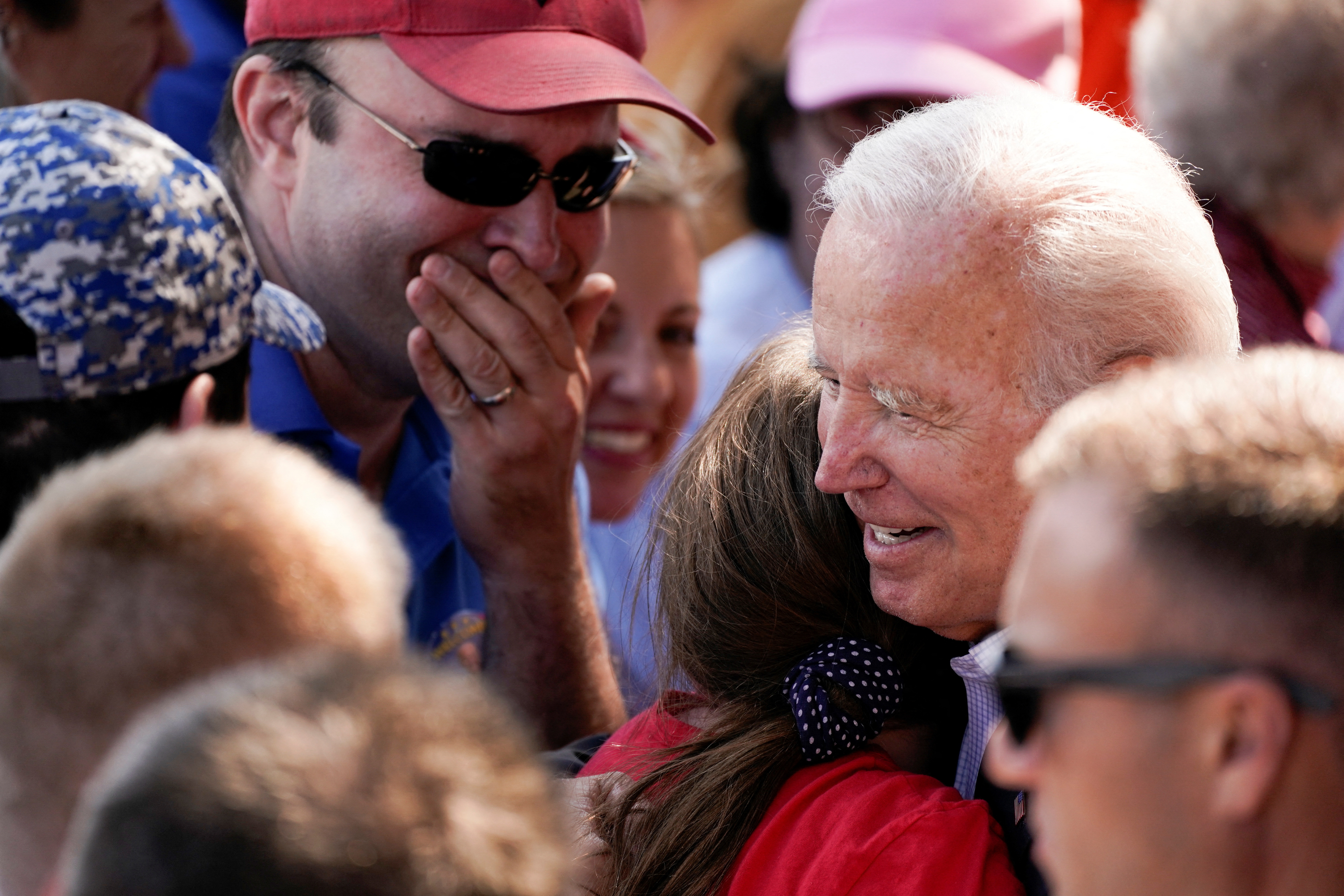 President Joe Biden meets with people in the crowd after delivering remarks on Labor Day at Henry Maier Festival Park in Milwaukee, Wisconsin, Sept. 5, 2022.