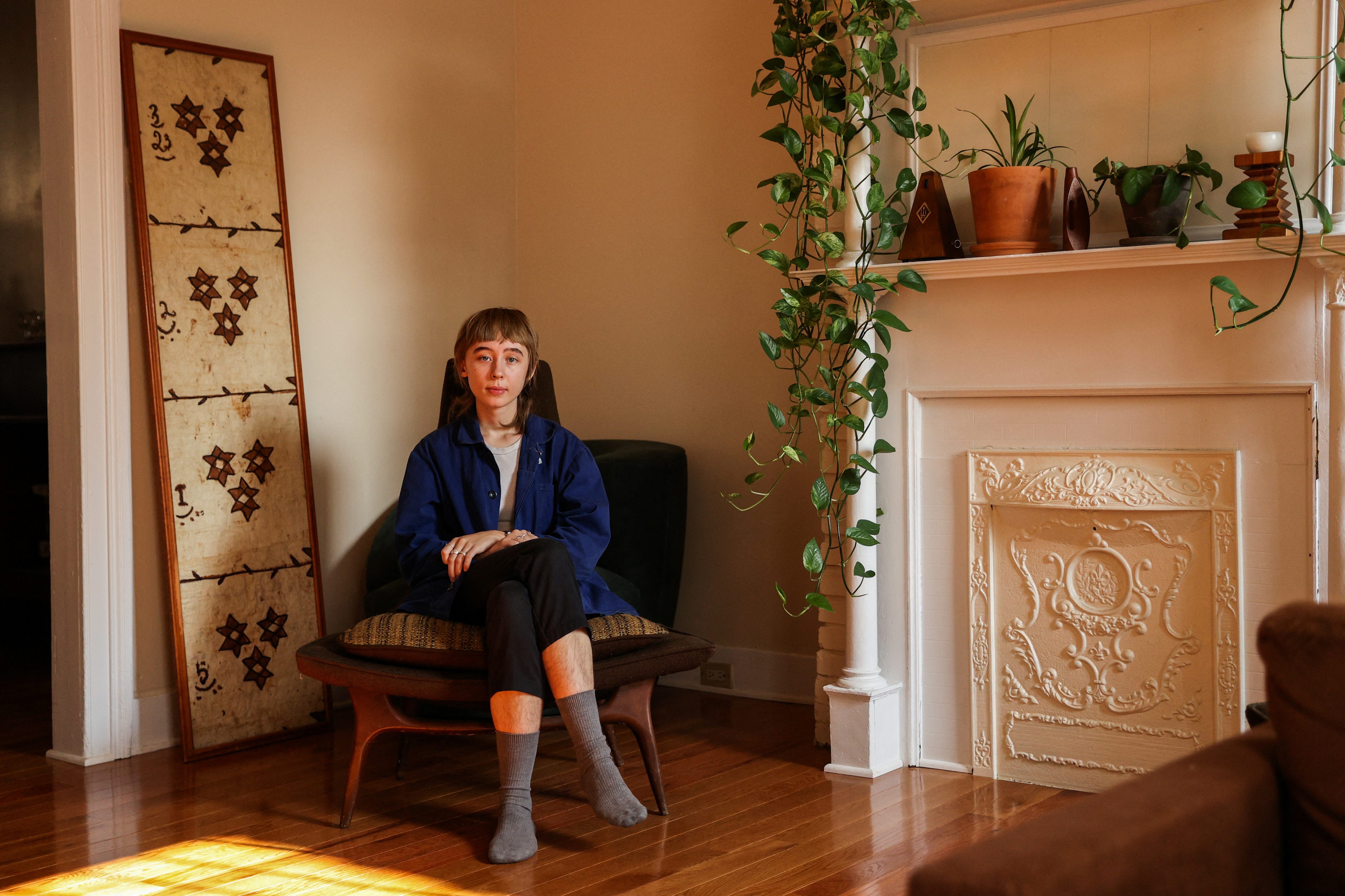 Maeve Kozlark poses for a portrait at her residence in Queens' neighborhood of Ridgewood, New York, Sept. 16, 2022.