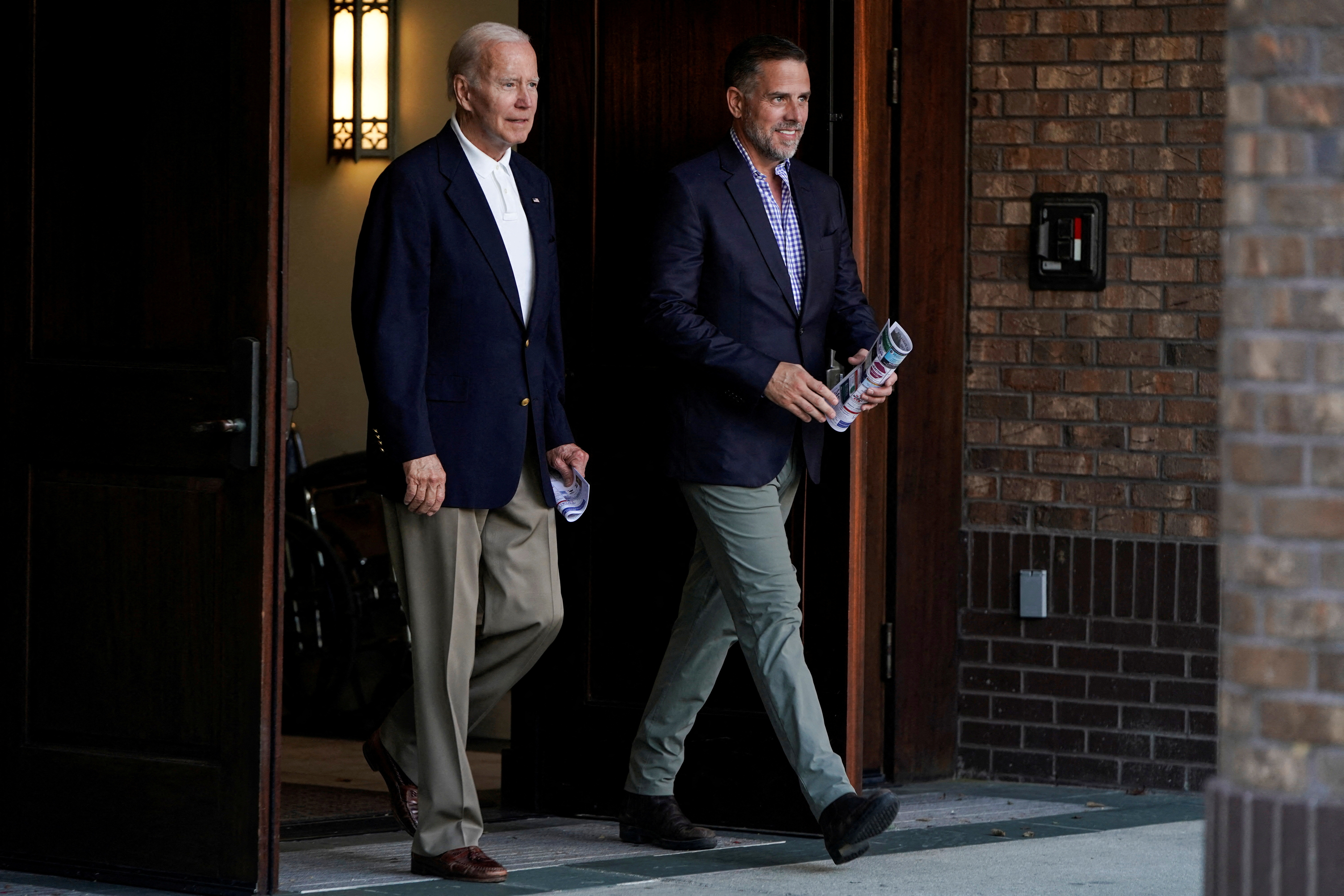 President Joe Biden and his son Hunter Biden depart from Holy Spirit Catholic Church after attending Mass on St. Johns Island, South Carolina, Aug. 13, 2022.