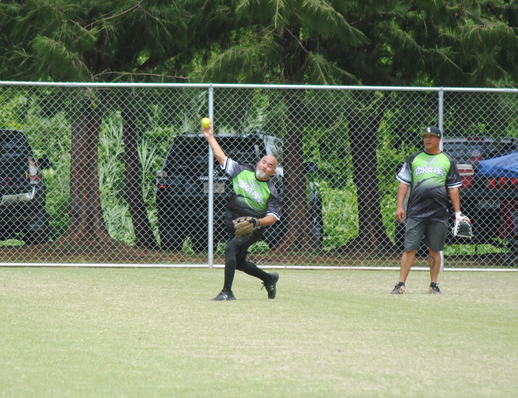 Tokahao left fielder Alvin Takai throws infield in an attempt for a double-play.
