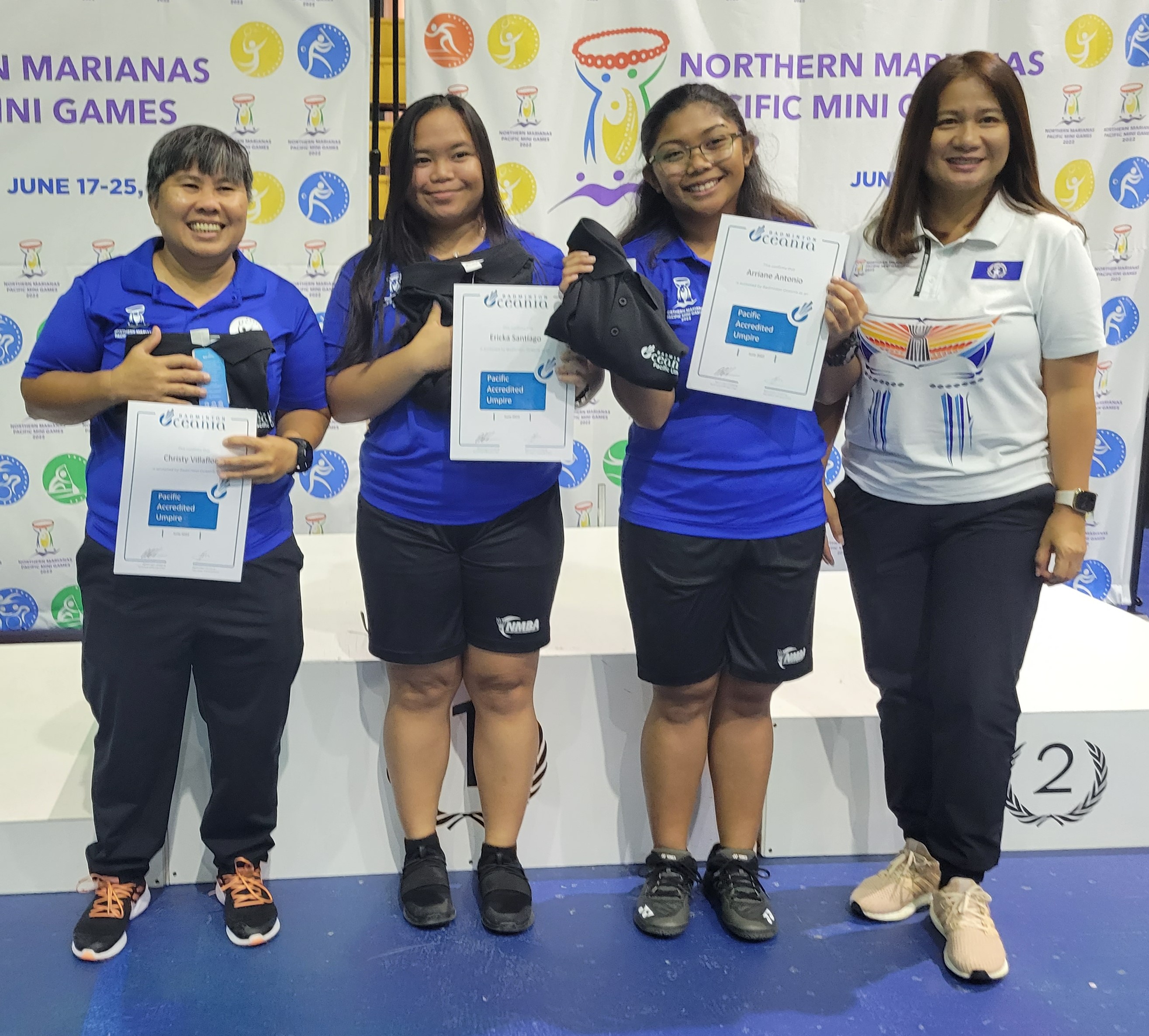 Newly certified Badminton World Federation Line Judge Christy Villaflor, left, poses for a photo with local umpires Ericka Santiago and Arianne Antonio and Northern Marianas Badminton Association president Merlie Tolentino during a recognition ceremony for umpires and line judges at the 2022 Northern Marianas Pacific Mini Games in June.