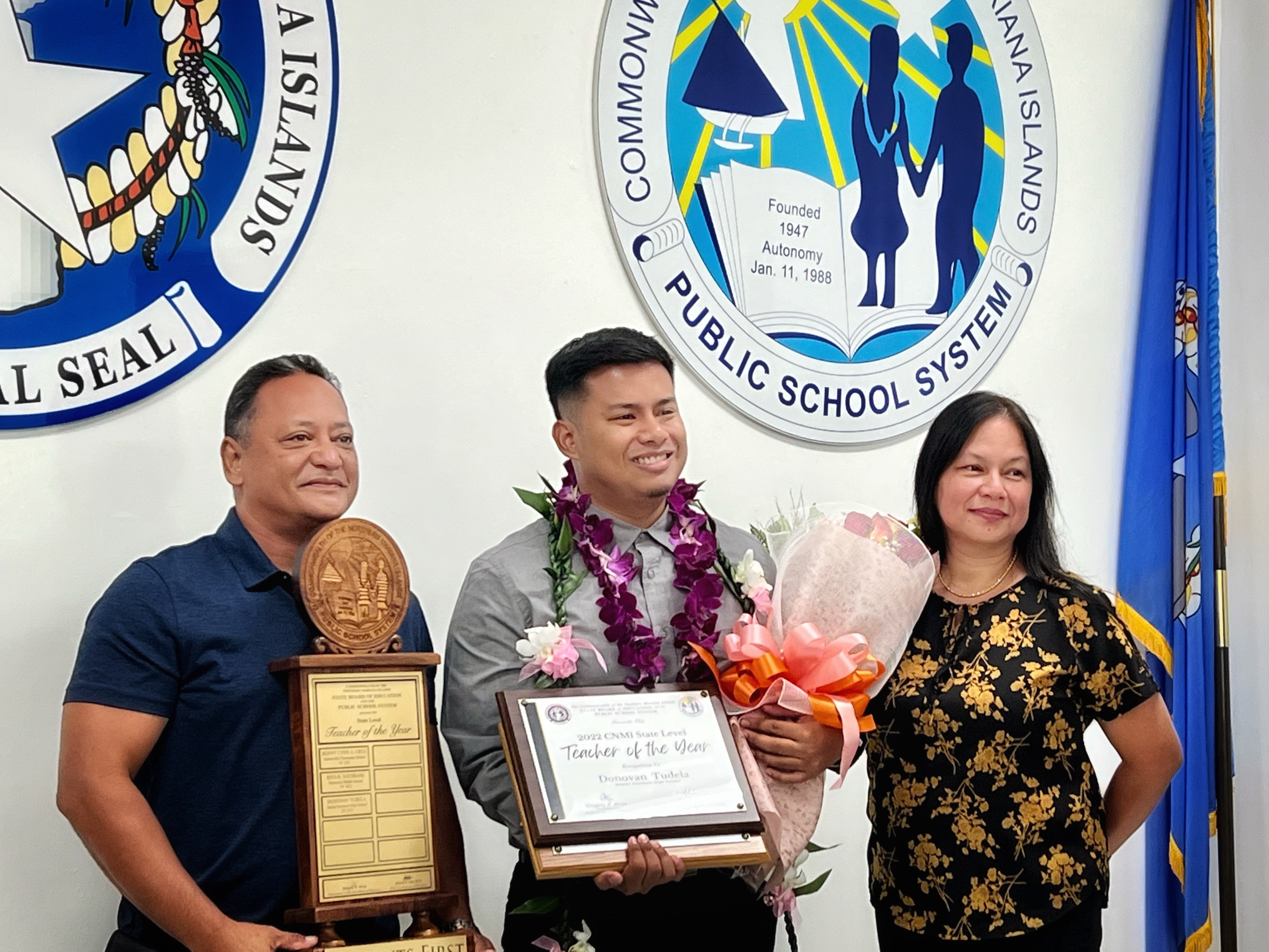 2023 PSS Teacher of the Year Donovan M. Tudela with proud parents Roman Tudela Jr. and Aristona Manibusan Tudela.