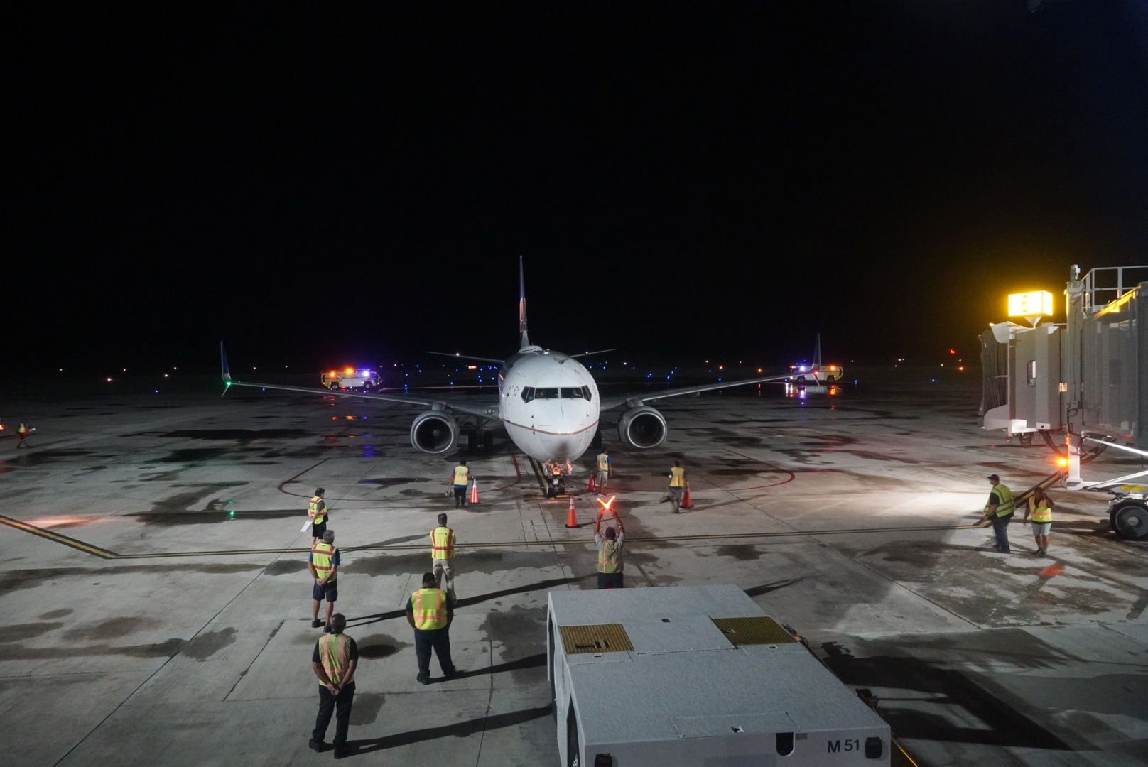 The United Airlines 737 aircraft, carrying passengers from the first Tokyo-Narita/Saipan direct flight in 10 years, is directed to Gate 6 at the Francisco C. Ada/Saipan International Airport early Friday morning.