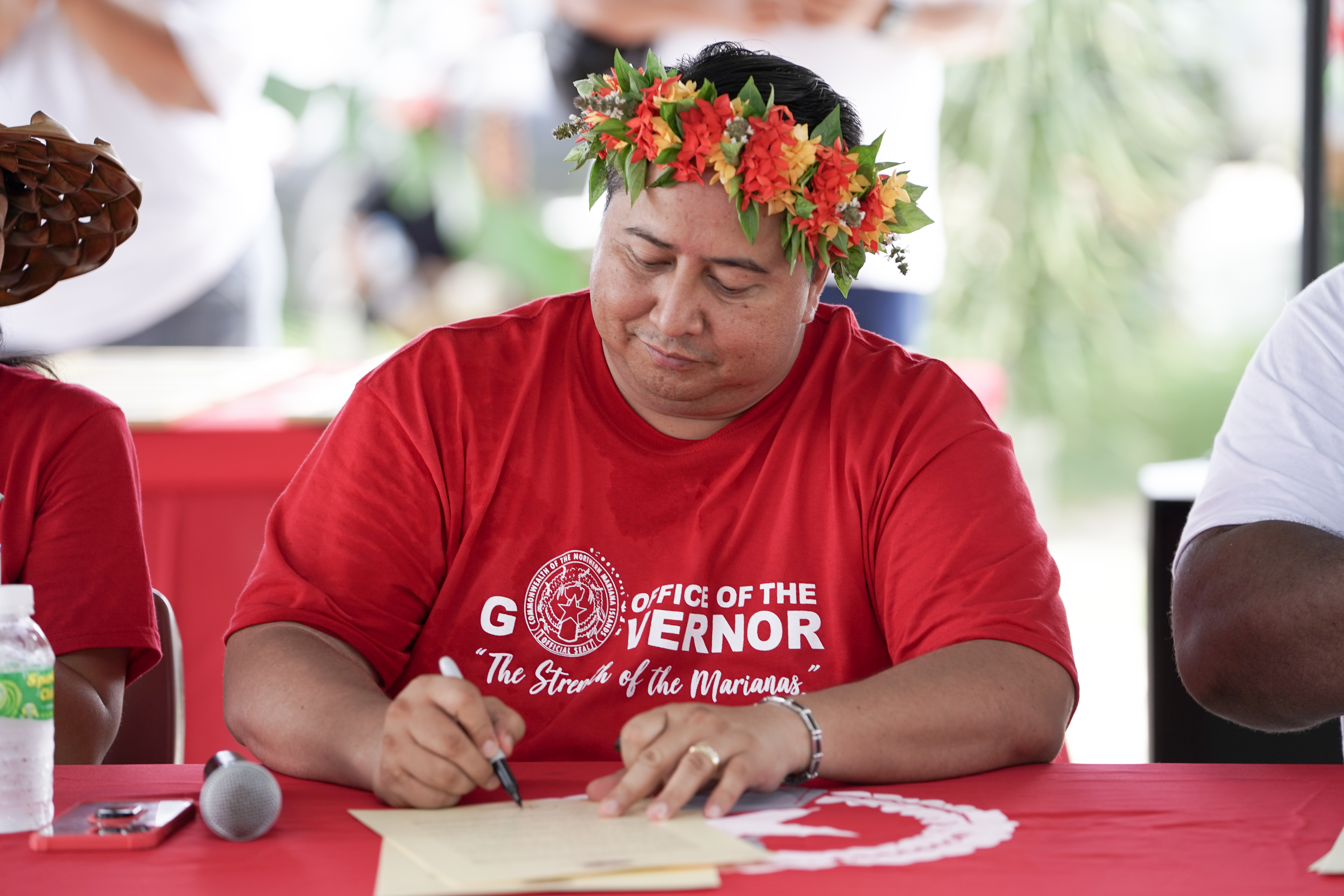 During the Labor Day celebration at the Garapan Fishing Base on Saturday, Gov. Ralph DLG Torres signs a proclamation designating September as Chamorro and Carolinian Cultural Heritage Month. 