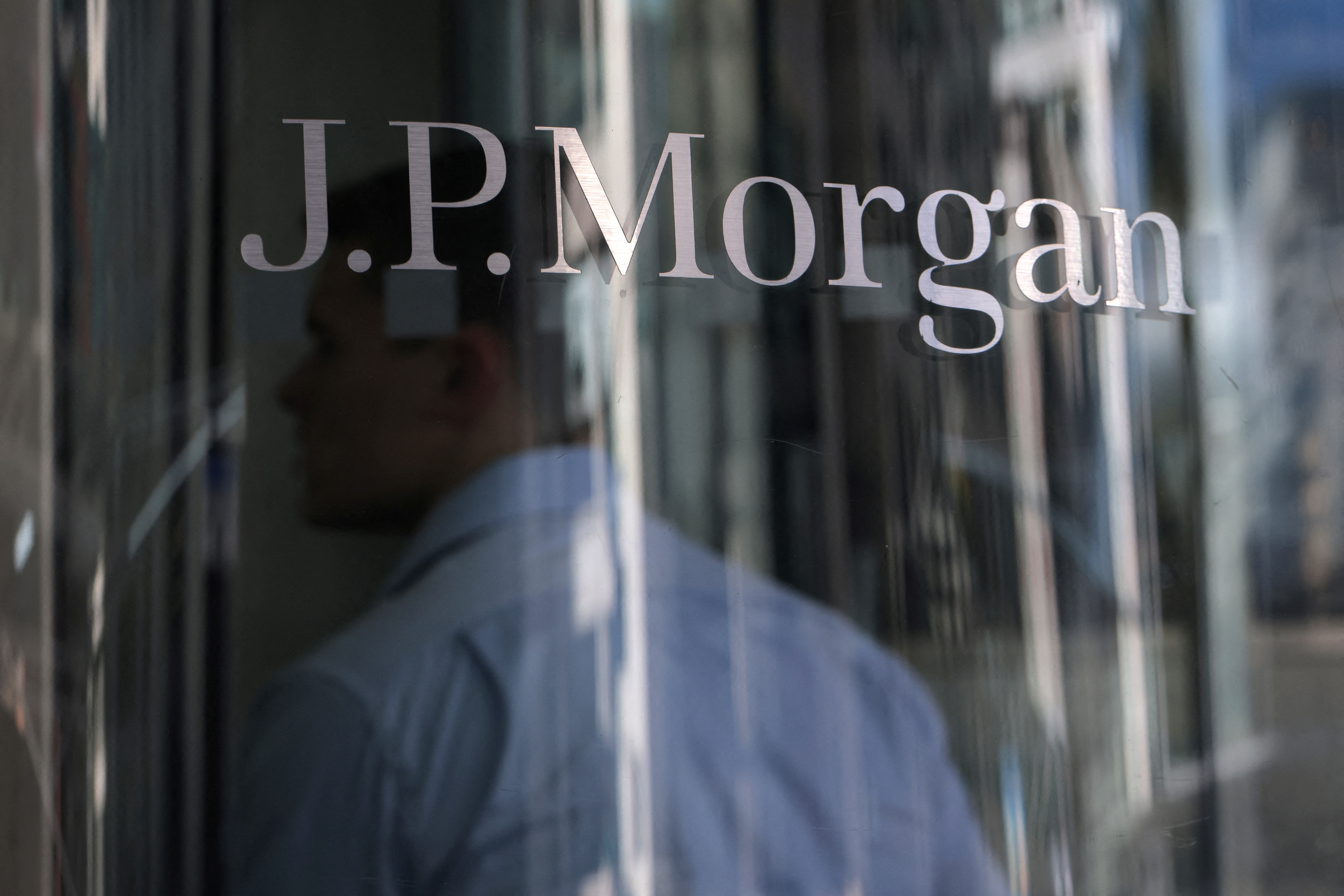 A person enters the JPMorgan Chase & Co. New York Head Quarters in Manhattan, New York City, June 30, 2022.