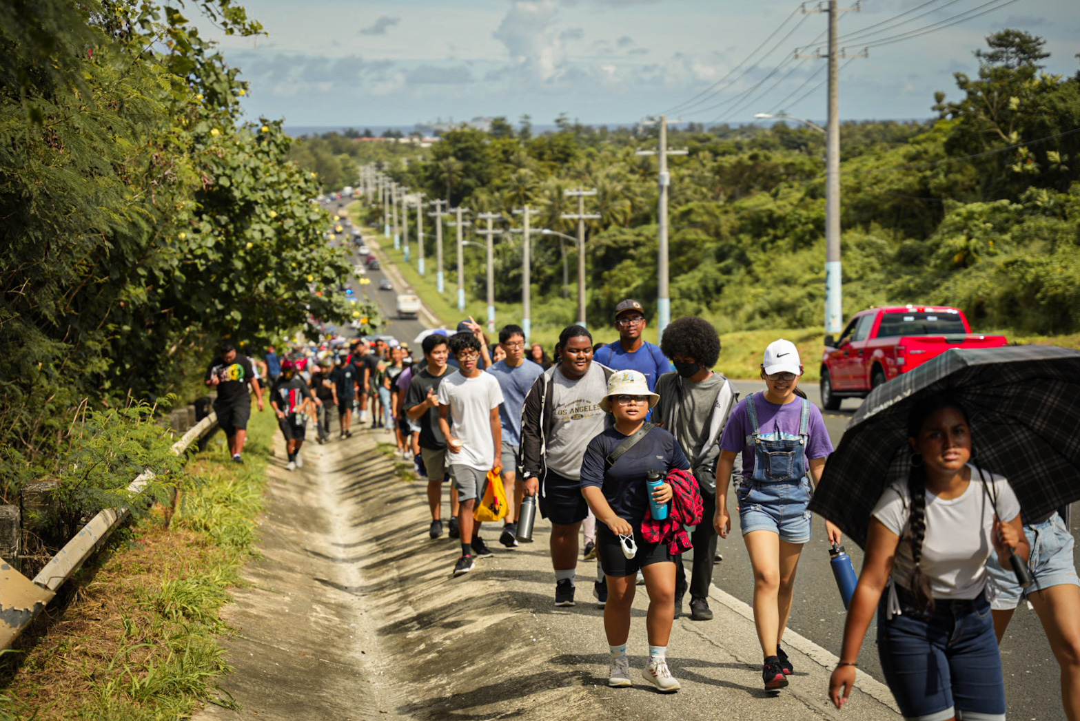Marianas High School students proceed to their designated evacuation zone, the As Terlaje campus of Northern Marianas College.
