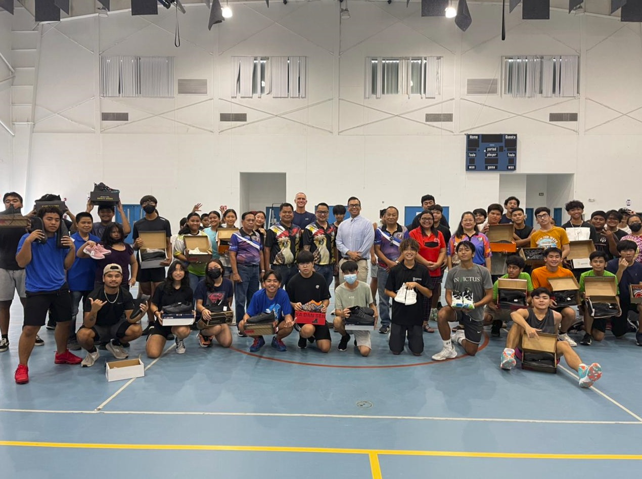 Marianas High School P.E. class students receive sneakers donated by the Fraternal Order of Eagles (Philippine Eagles)  on Sept. 21, 2022.