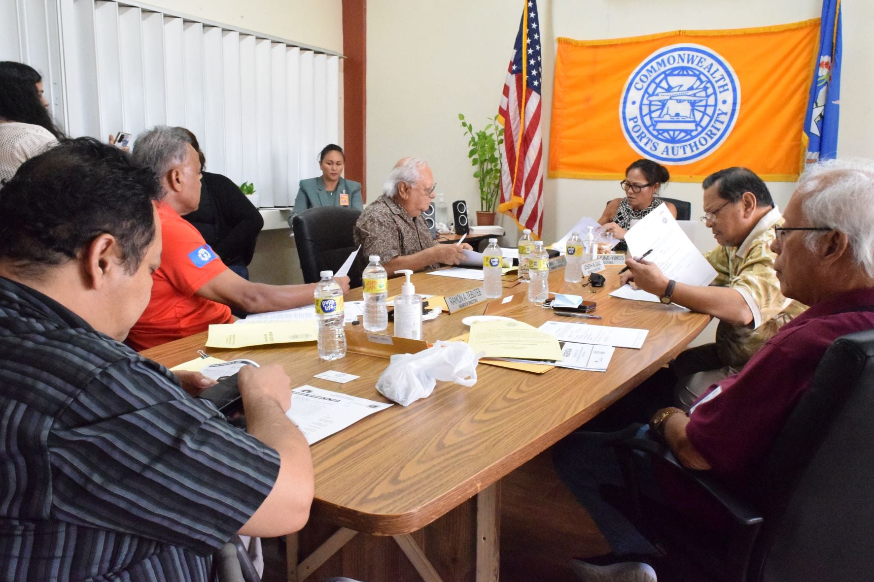 Commonwealth Ports Authority Board Chair Kimberlyn King-Hinds third right, speaks during an emergency meeting Friday in the CPA conference room.
