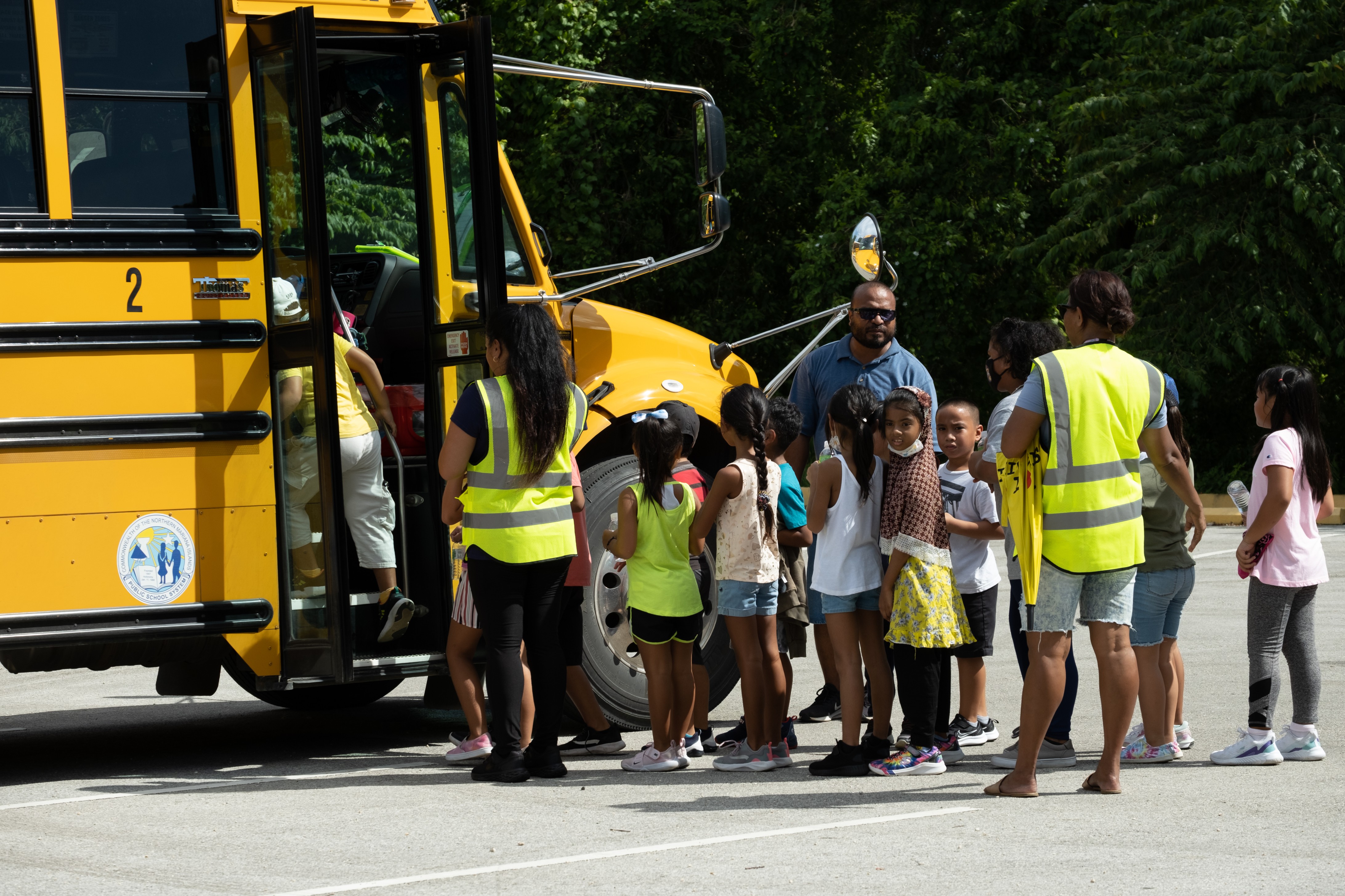 Garapan Elementary School students are transported by the PSS Office of Pupil Transportation following the tsunami drill.