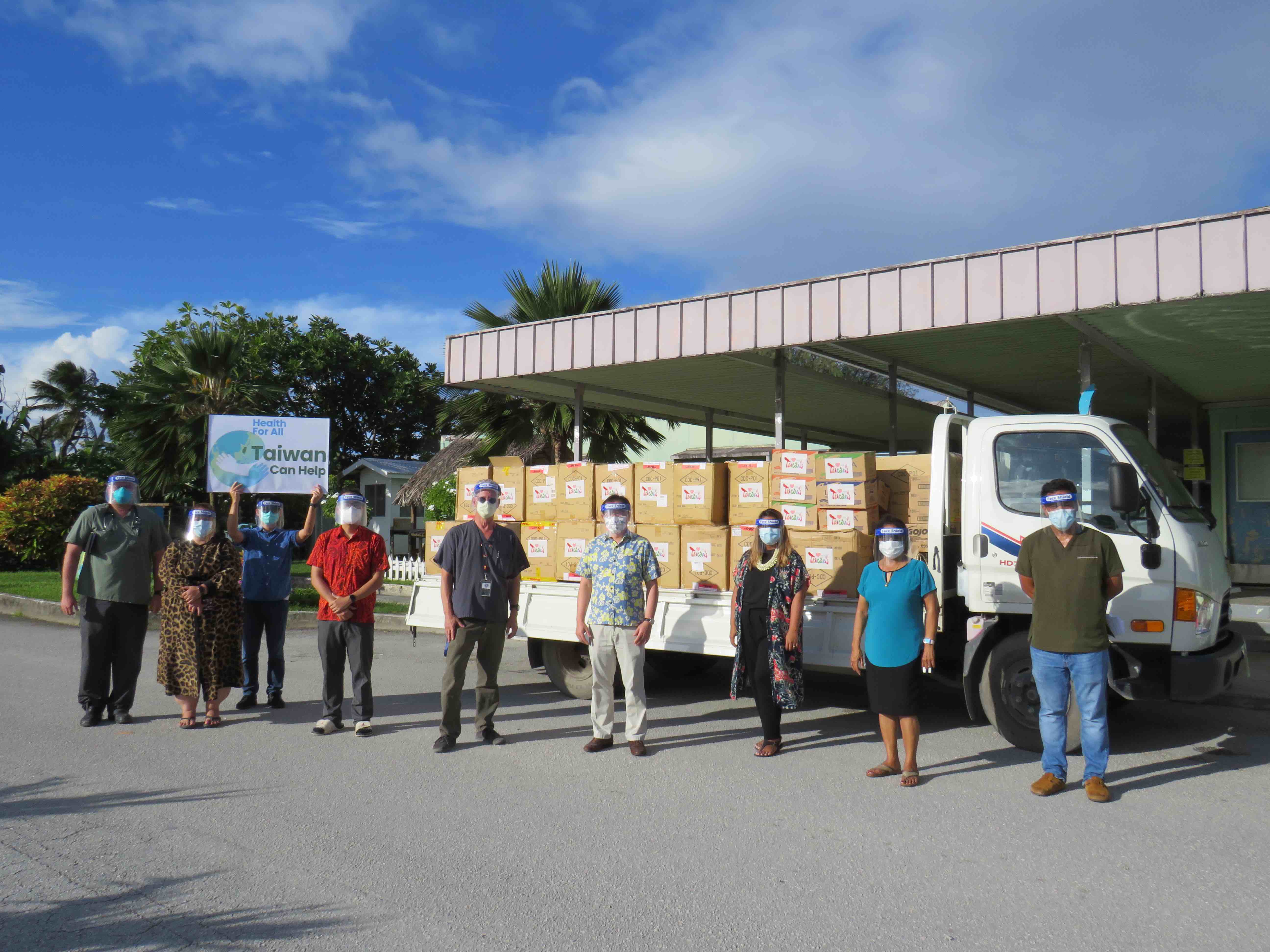 Following last month's Covid outbreak, the Marshall Islands announced Thursday it is opening its borders Sept. 8. Health Secretary Jack Niedenthal, center, joined with Taiwan Ambassador Jeffrey S.C. Hsiao, fourth from right, Taiwan Embassy staff and Ministry of Health officials to accept a donation of Covid supplies and equipment last month.