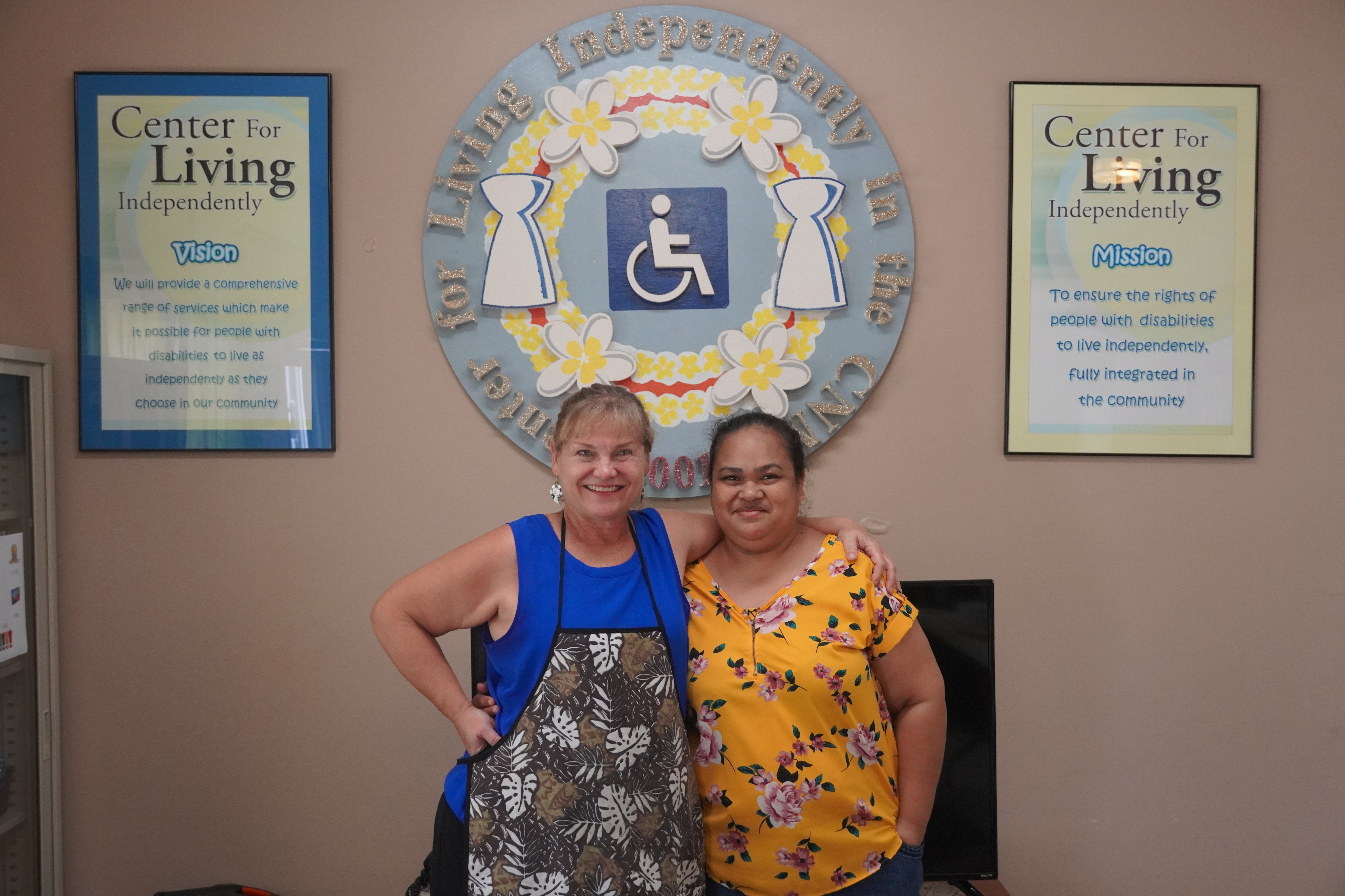 Center for Living Independently Executive Director Susan Satur, left, and office assistant Matilde Selepeo pose for a photo.